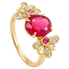14 Karat Gold Ring with Ruby and Diamonds.