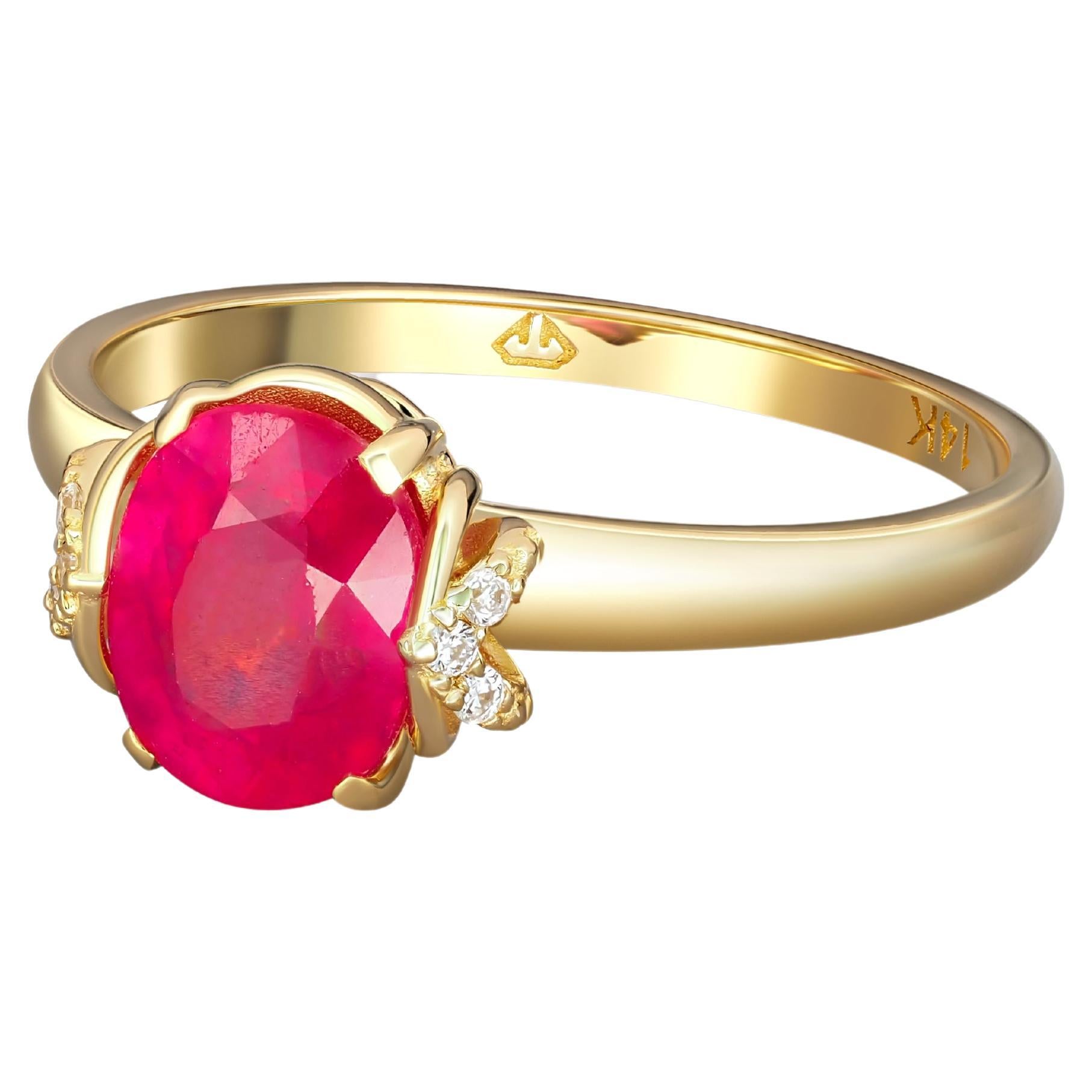 14 Karat Gold Ring with Ruby and Diamonds. Oval ruby ring!