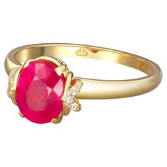 14k Gold Ring with Ruby and Diamonds. Oval ruby ring!