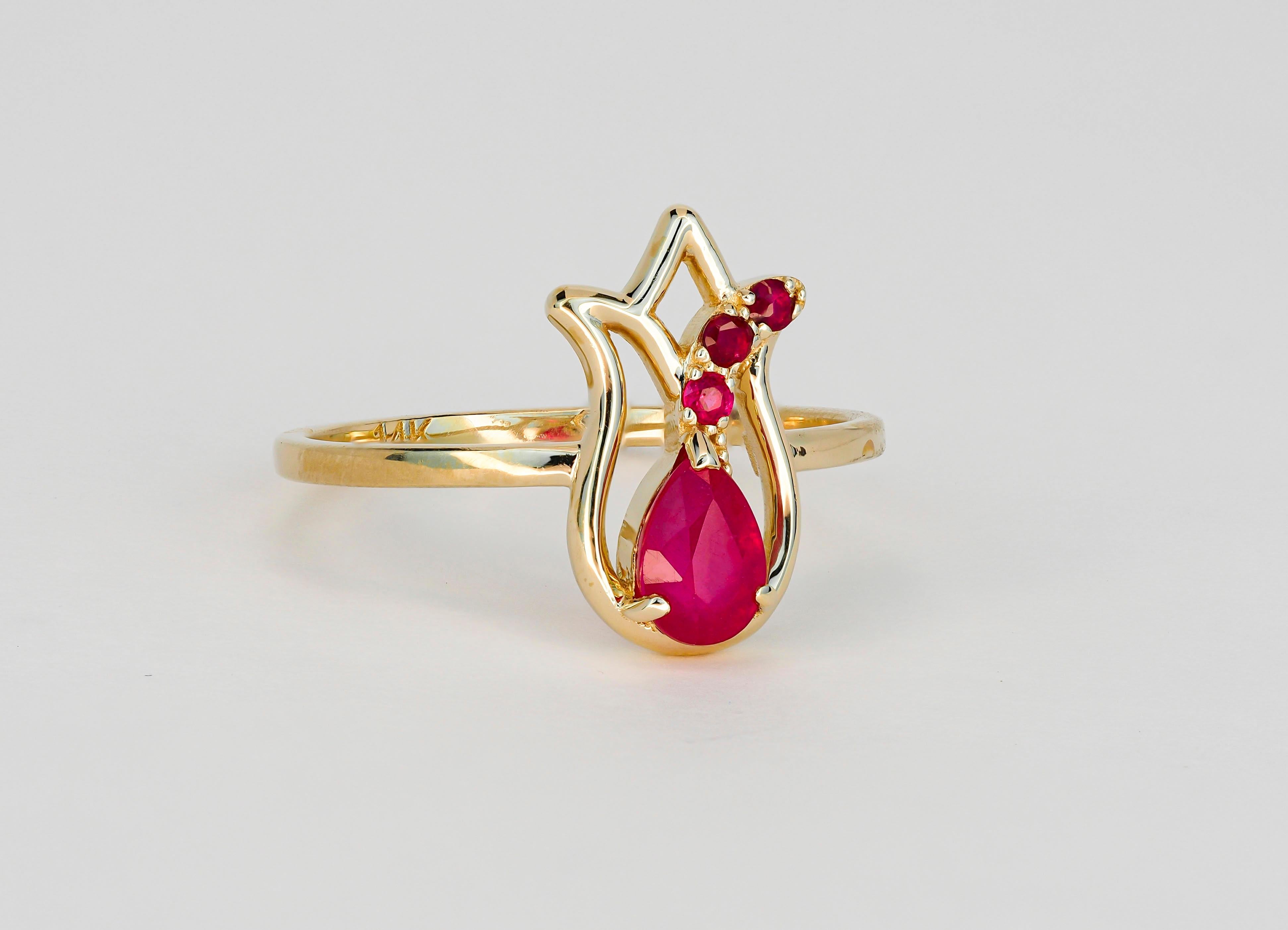14 kt solid gold tulip ring with ruby and side rubies. July birthstone.
Weight approx. 2.00 g. - depends from size

Central stone: Natural ruby
Pear cut, weight - 0.70 ct, color - red
Clarity: Transparent with inclusions  
Surrounding stone:
Natural