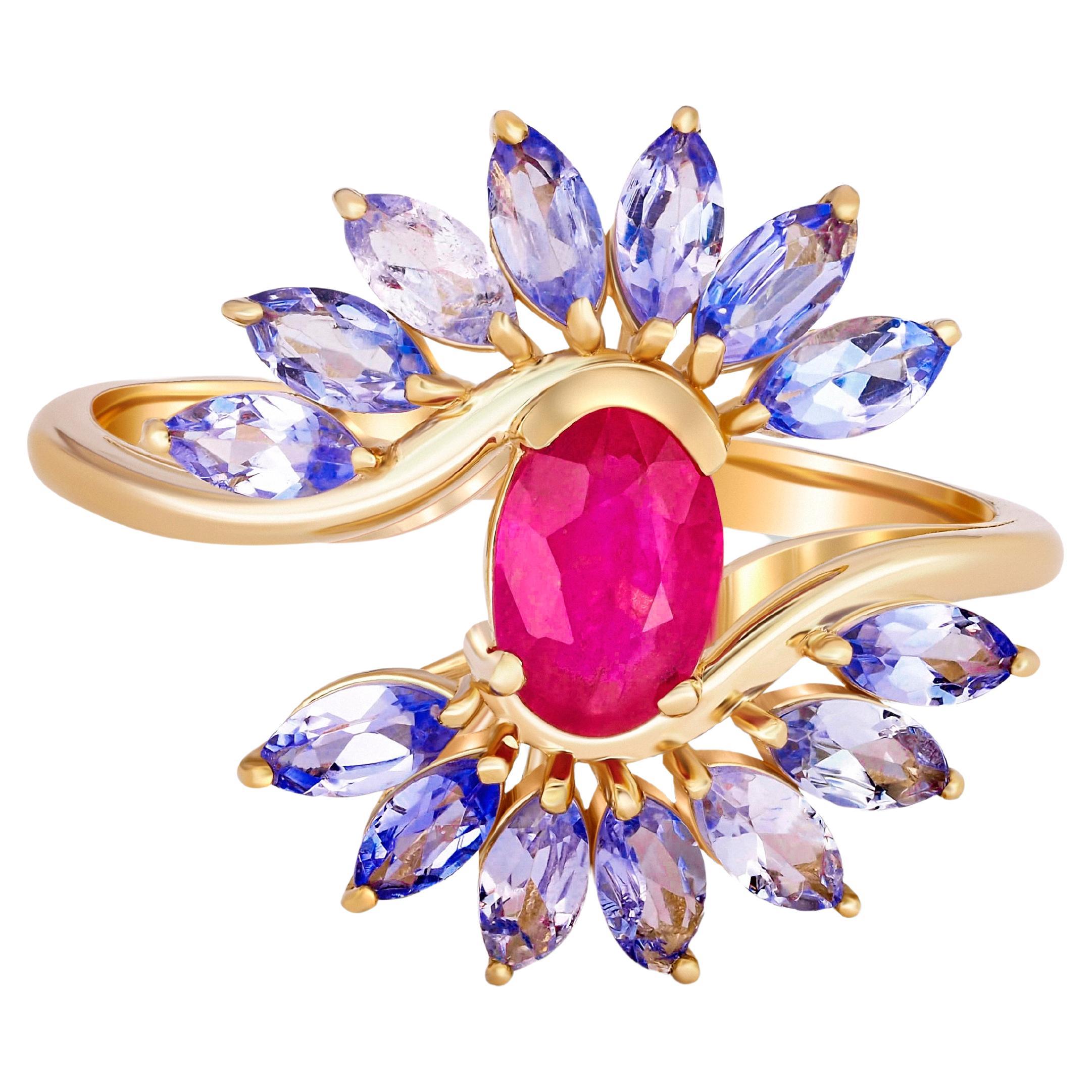 For Sale:  14 karat Gold Ring with Ruby and Tanzanites. Oval ruby ring. Tanzanite ring!