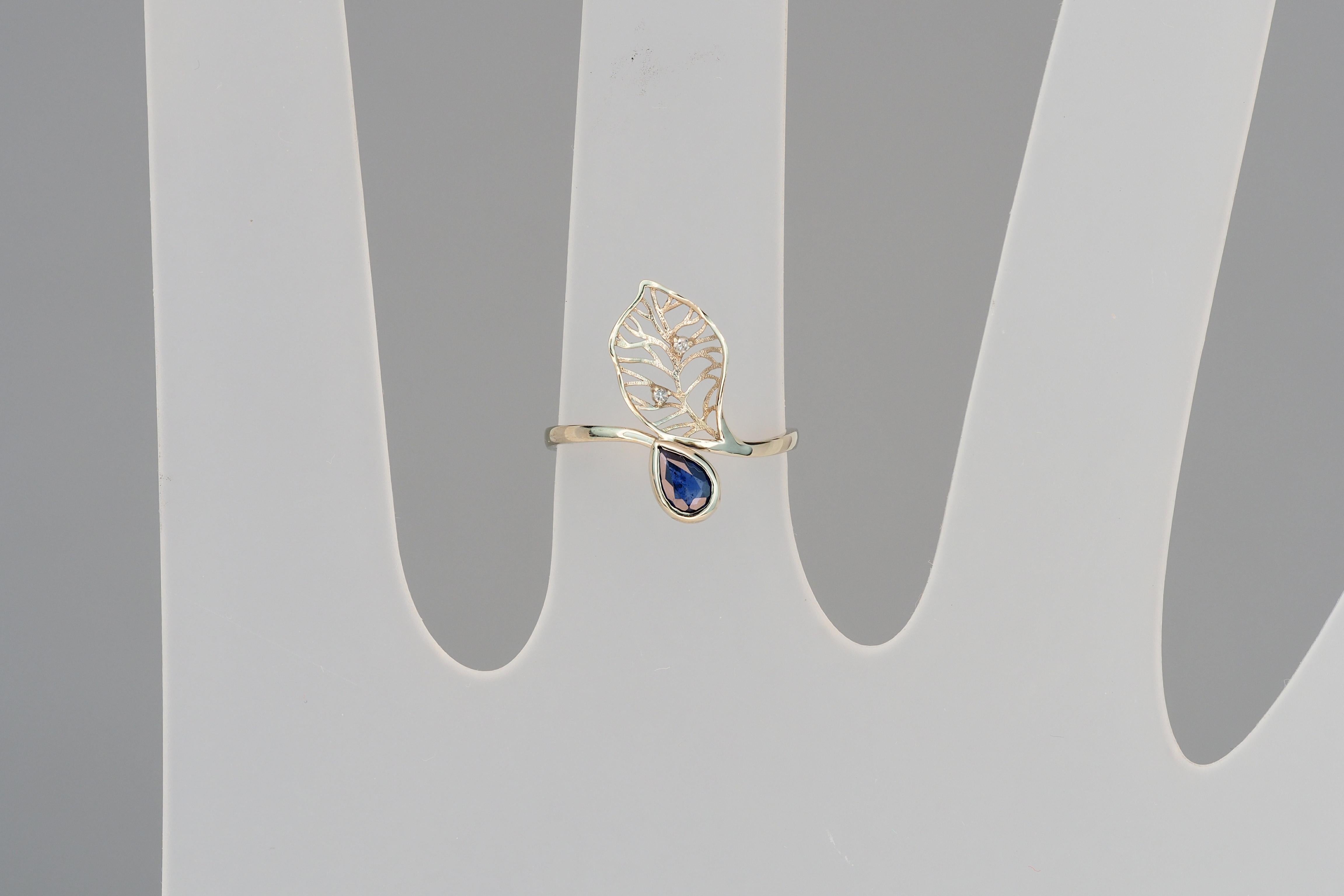 For Sale:  14 Karat Gold Ring with Sapphire and Diamonds. Floral Design Ring with Sapphire 8