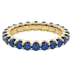 14 Karat Gold Sapphire Eternal Fit Eternity Band Features 2.99 Carat of Blue