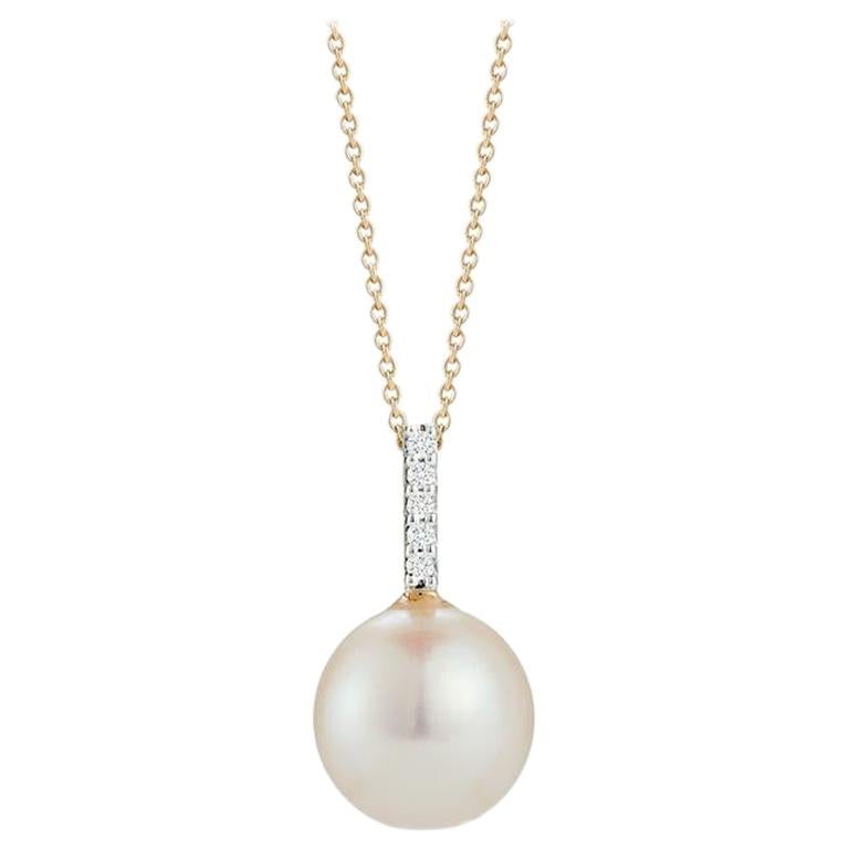 14 Karat Gold Simple Pearl and Diamond Pendant For Sale
