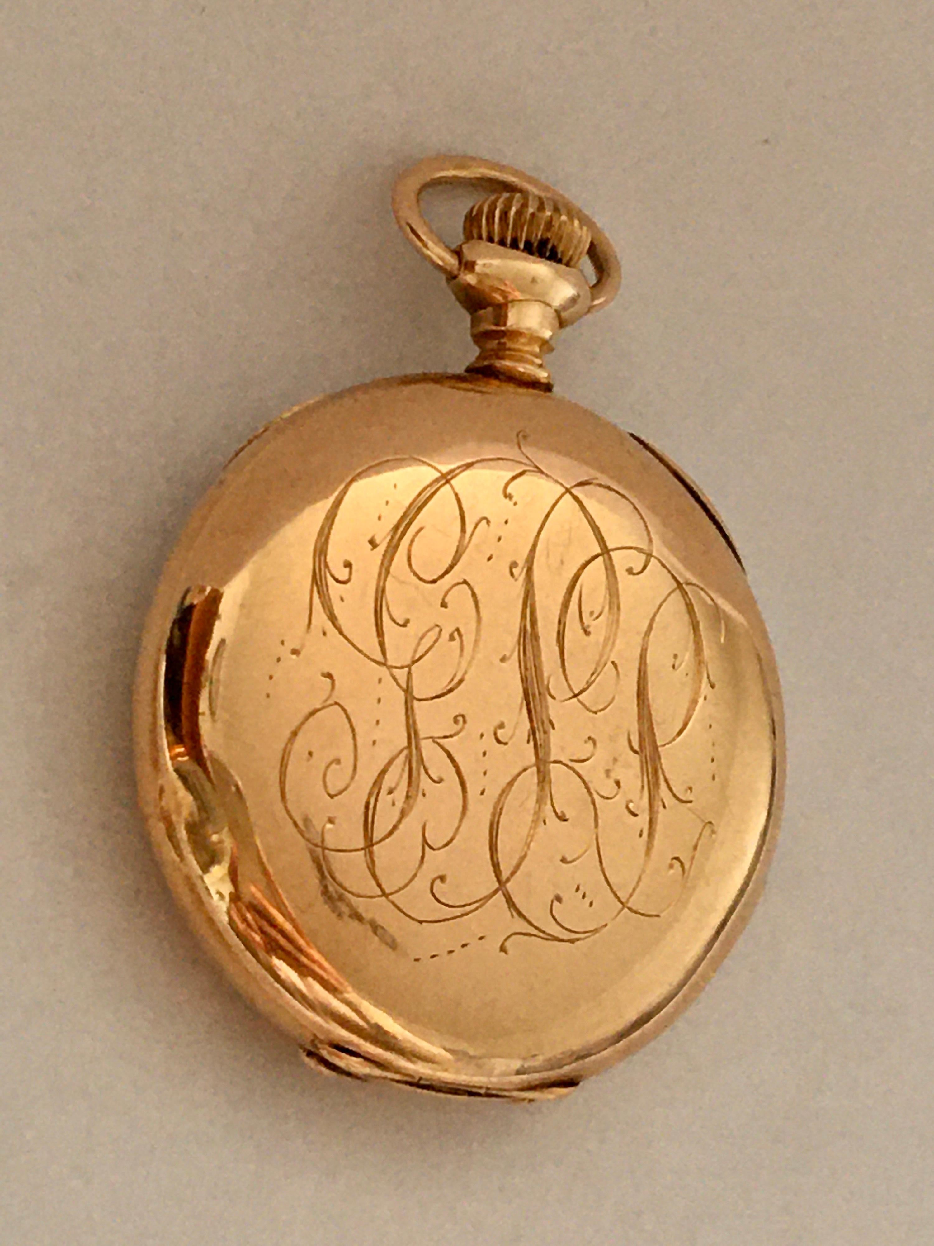 This beautiful 33mm case diameter keyless gold pocket watch watch is in good working condition and ticking well but I cannot guarantee the time accuracy. Visible signs of ageing and wear with hairline cracks on the dial as shown. This watch weighed