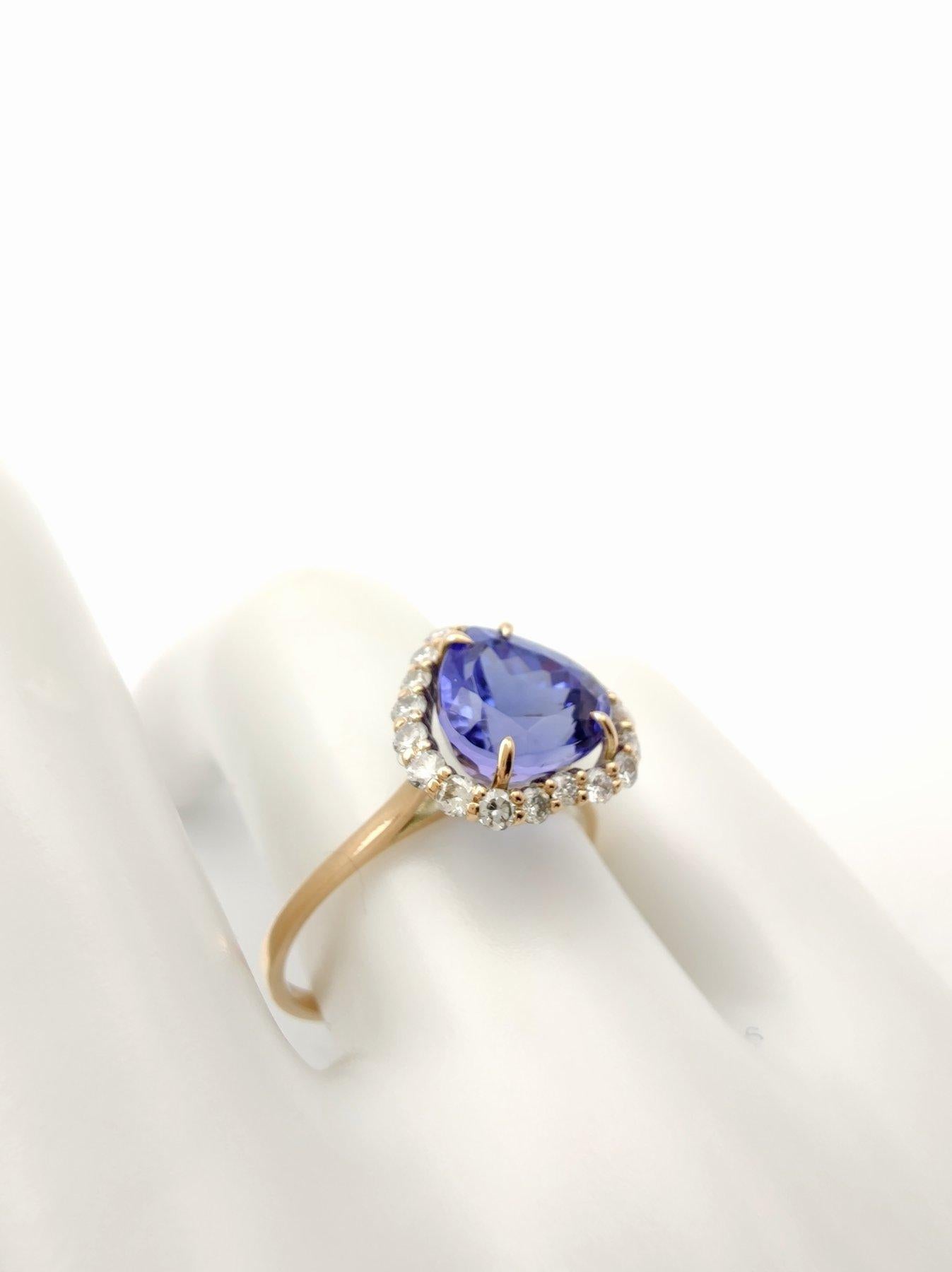 Contemporary 14 karat Gold - Tanzanite Ring  Diamonds, for weddings, engagements, proposals For Sale