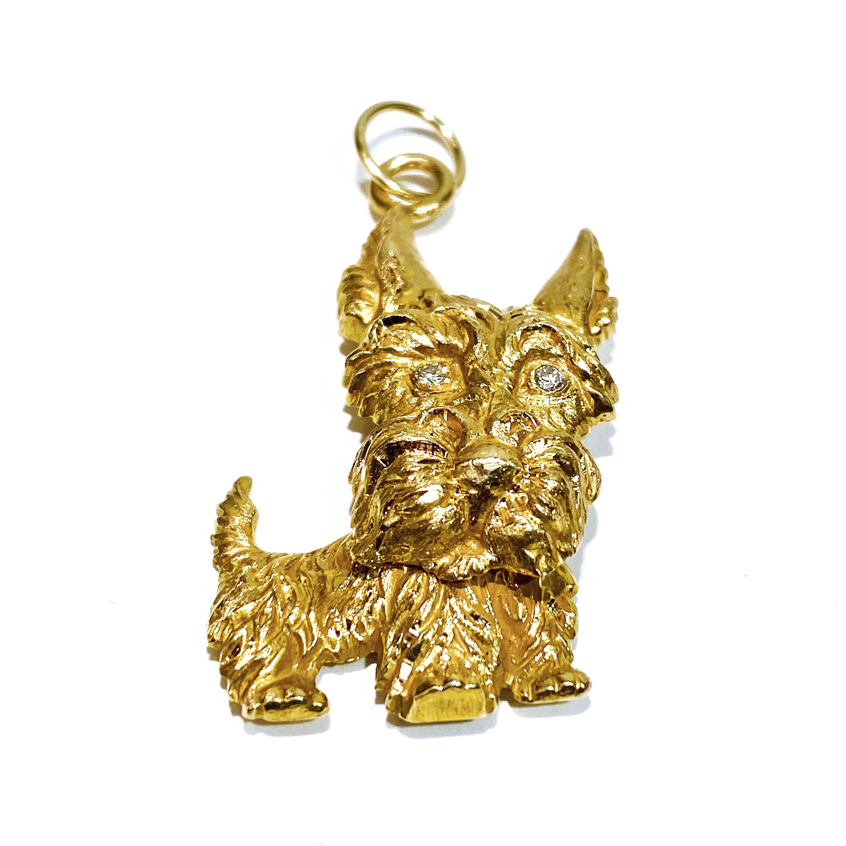 14 Karat Gold Terrier Dog Pendant. The adorable Terrier dog has a hinge on the back of the neck allowing the head to tilt to both the left or right. The diamonds are SI1 in clarity (G.I.A.) and H in color (G.I.A.). Two round diamonds are bezel-set