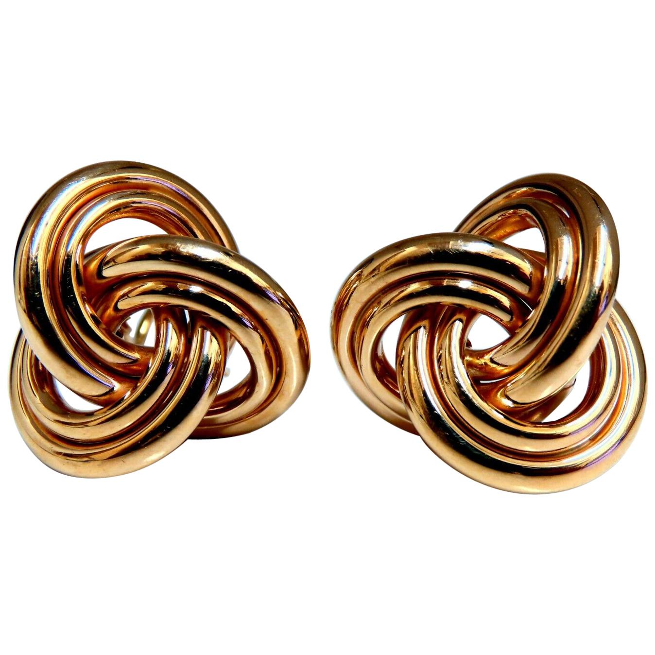 Pendientes de clip con tres tubos entrelazados y textura, de oro de 14 quilates*