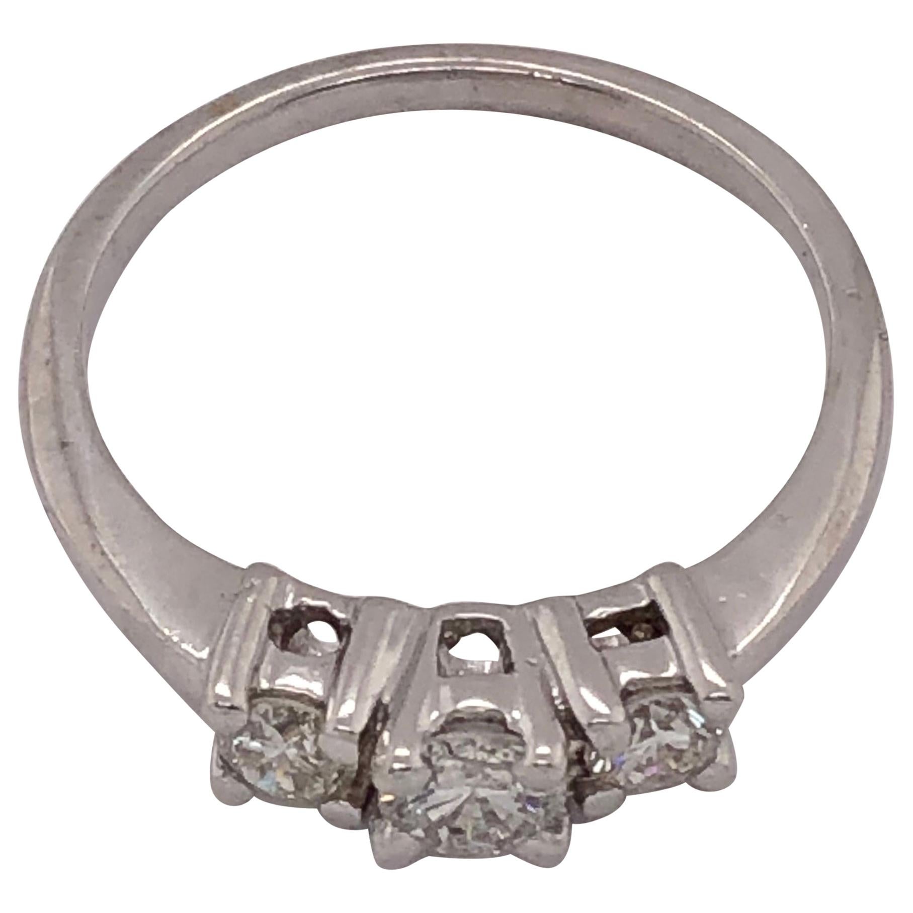 14 Karat Gold Three-Stone Diamond Engagement Anniversary Bridal Ring 0.75 TDW