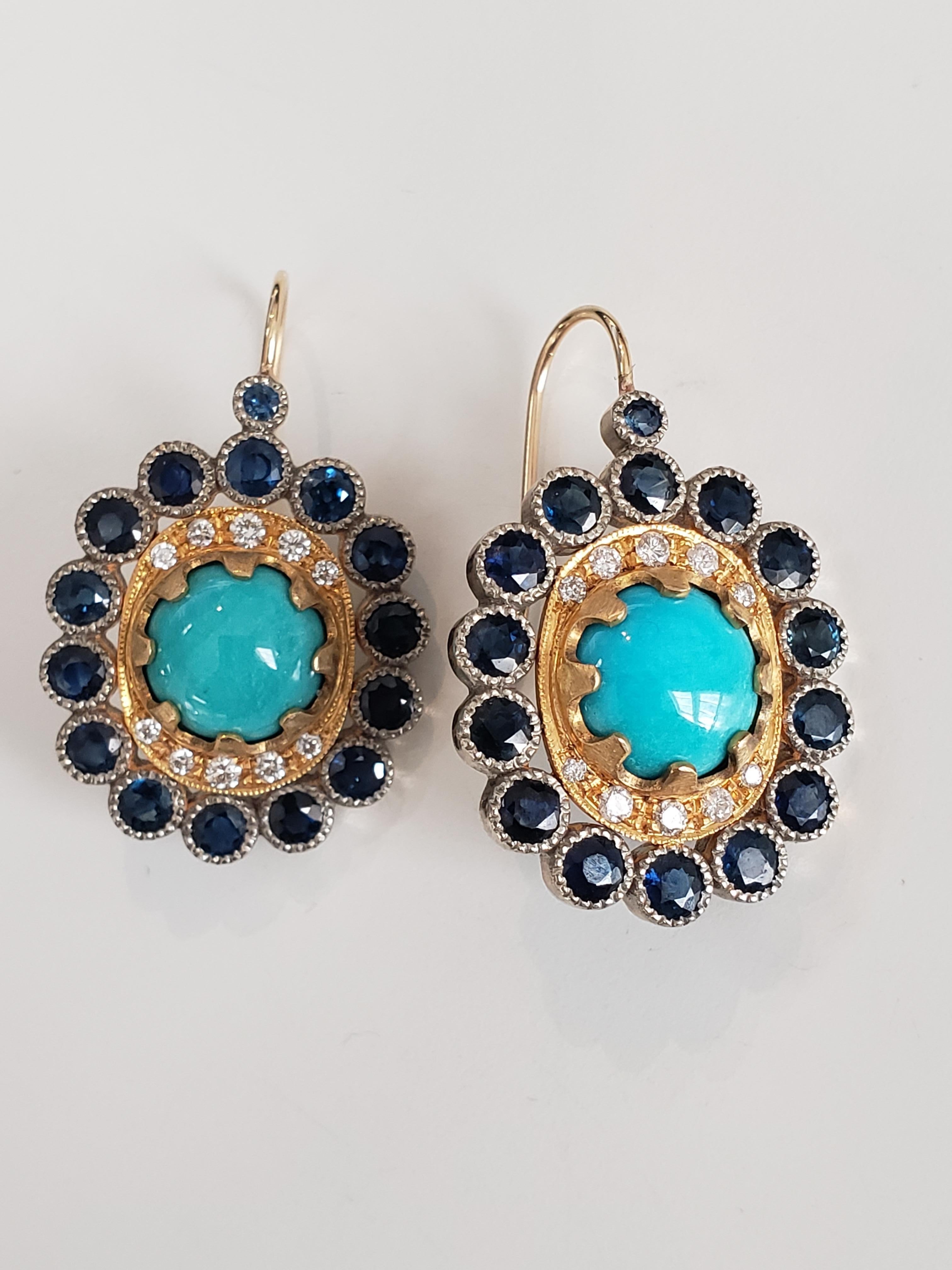 Earrings- Sleeping Beauty Turquoise set in 14K White Gold with Blue Sapphire. 
Turquise 5.0cts
Blue Sapphire 7.0cts
Diamond .15cts
Hand Miligrain details and mixing colors of gold gives these earnings a timeless quality. 