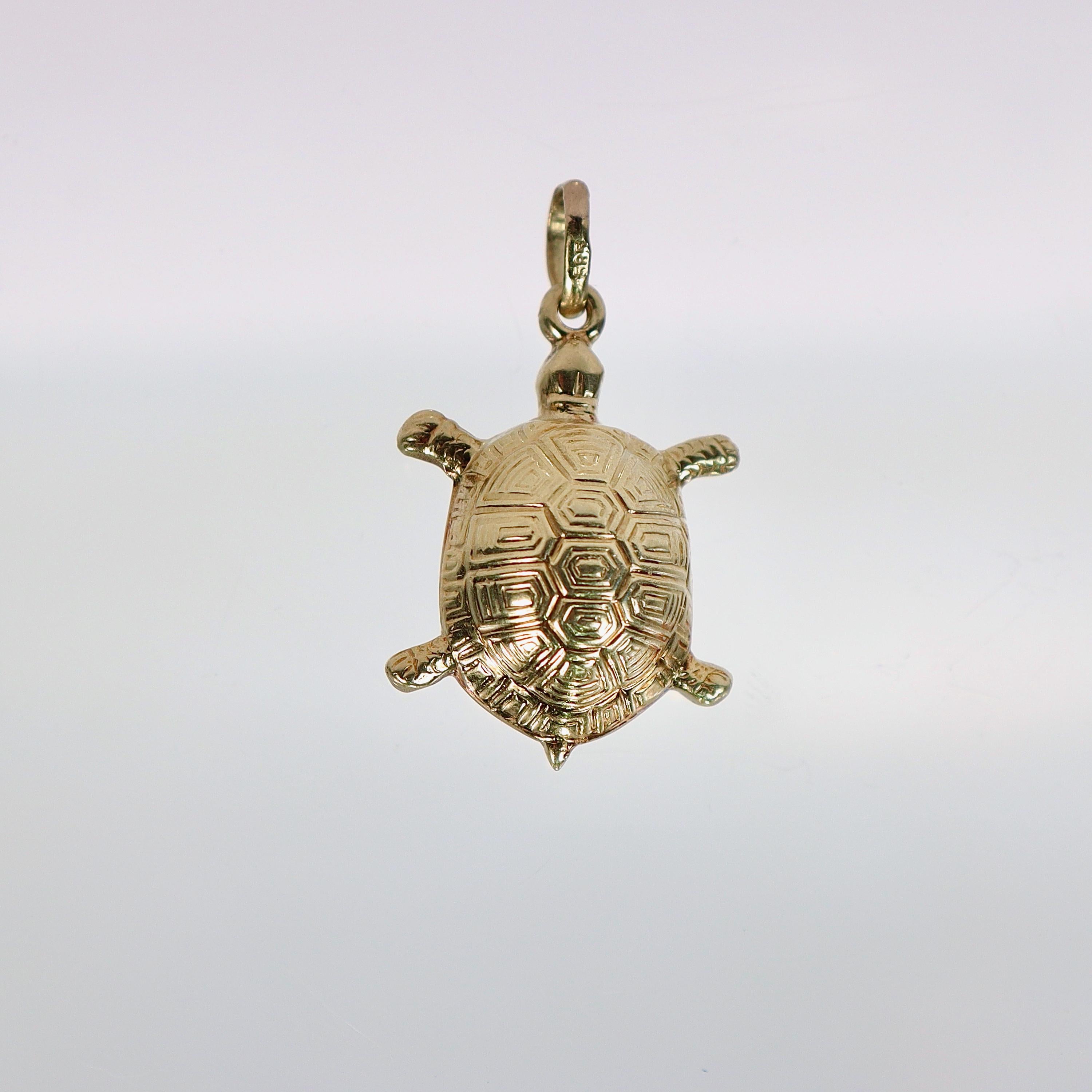 A very fine turtle pendant or charm for a bracelet.

In 14k yellow gold.

With an engraved pattern on shell.

Simply a wonderful turtle charm!

Date:
20th Century

Overall Condition:
It is in overall good, as-pictured, used estate condition with