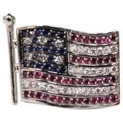 14 Karat Gold Waving "American Flag" Pin with Diamonds, Rubies and Sapphires
