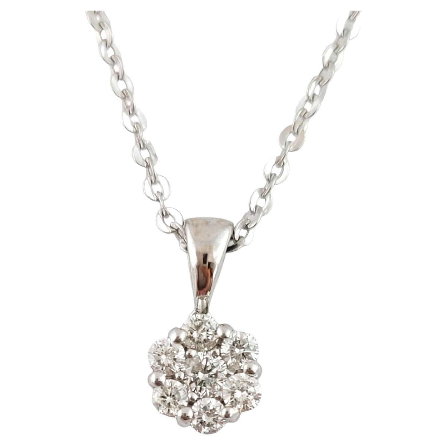 Vintage 14 Karat White Gold Diamond Pendant Necklace

This sparkling pendant features seven round brilliant cut diamonds set in elegant 14K white gold. Suspended from a classic cable necklace.

Approximate total diamond weight: .31 ct.

Diamond