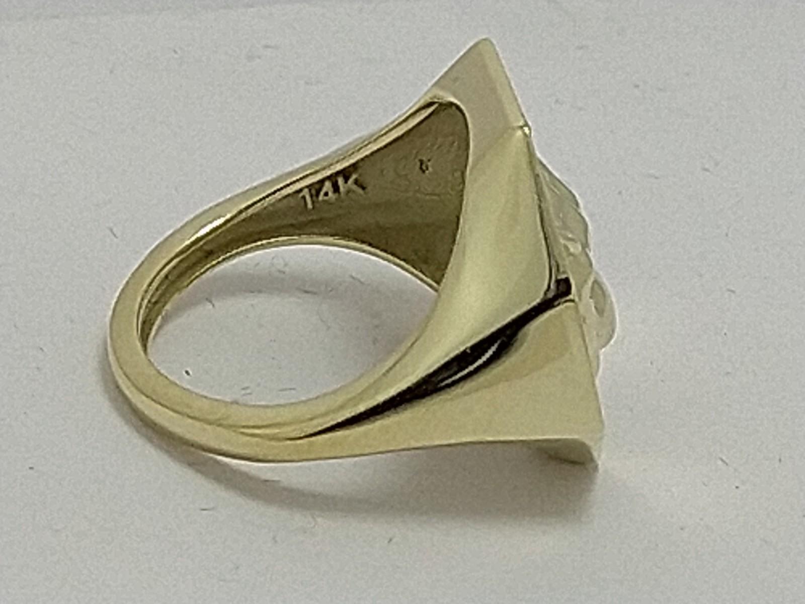 For Sale:  14 Karat Green Gold Mens Cougar Signet Ring with Tsavorite Eyes 7