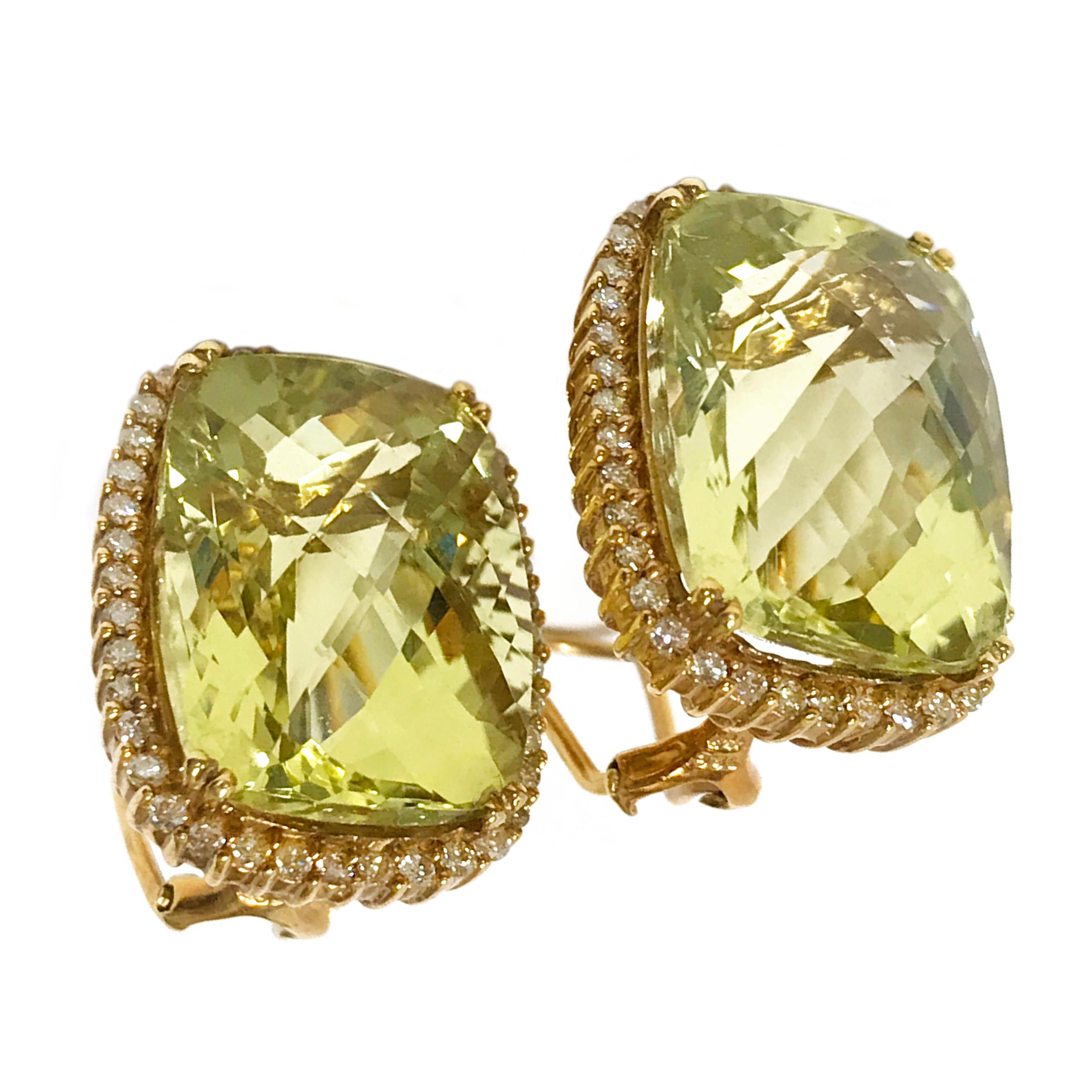 14 Karat Green Topaz Diamonds Earrings. Each earring features a 13mm x 18mm cushion-cut bezel-set Green Topaz with forty round diamonds around the bezel. Diamonds are round brilliant-cut SI in clarity (G.I.A.) and H-I in color (G.I.A). The diamonds