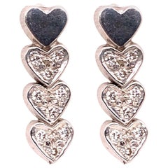 14 Karat Heart Screw Back Earrings with 18 Diamonds