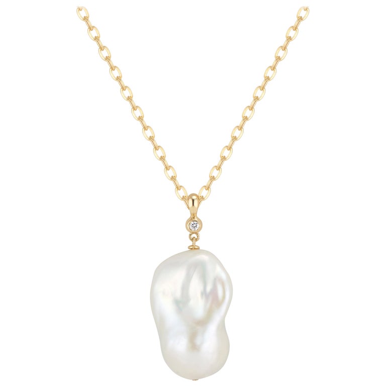 14 Karat Large Baroque Pearl and Diamond Pendant For Sale