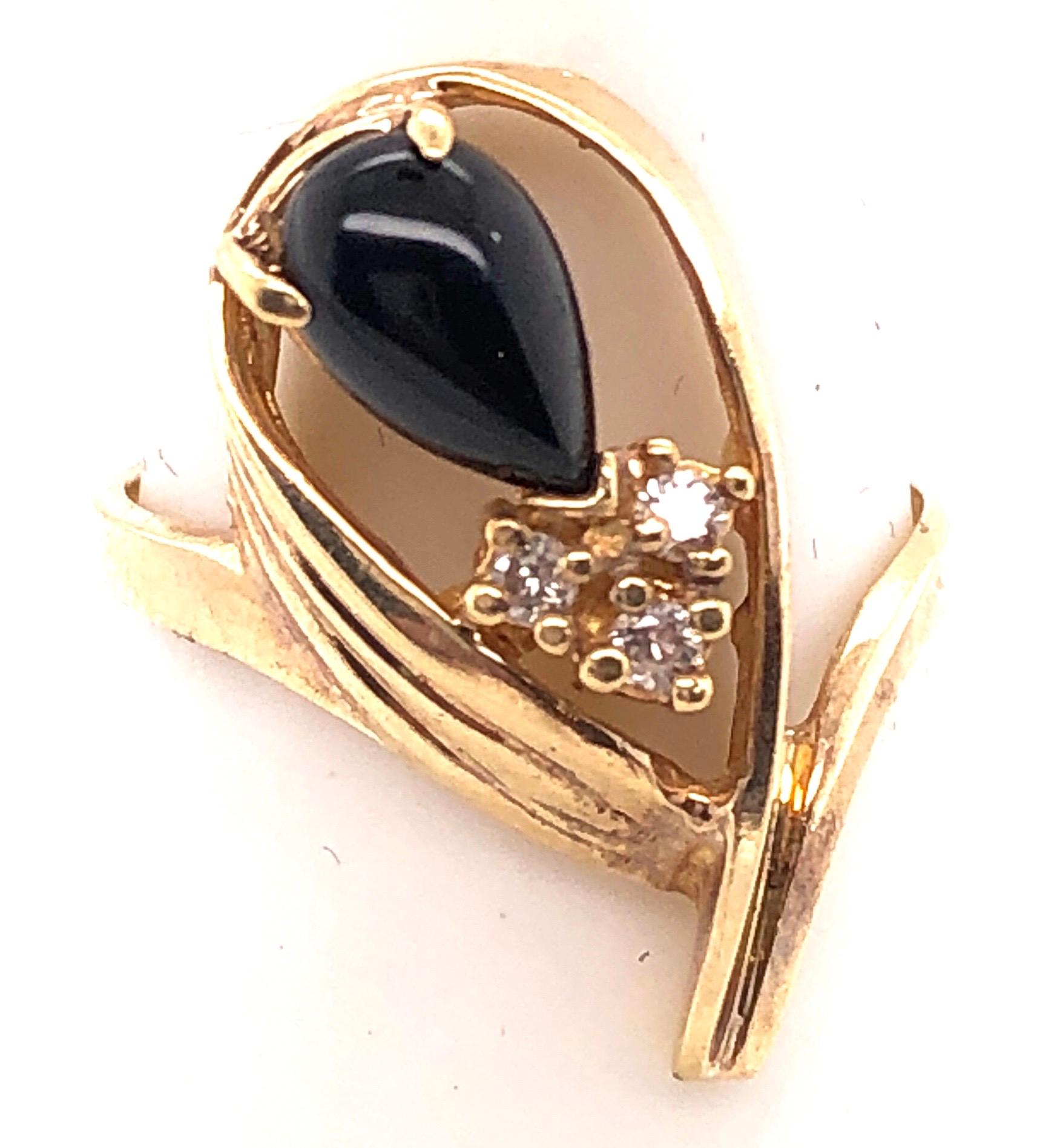 Women's or Men's 14 Karat Onyx and Diamond Yellow Gold Ring Freeform 0.03 TDW For Sale
