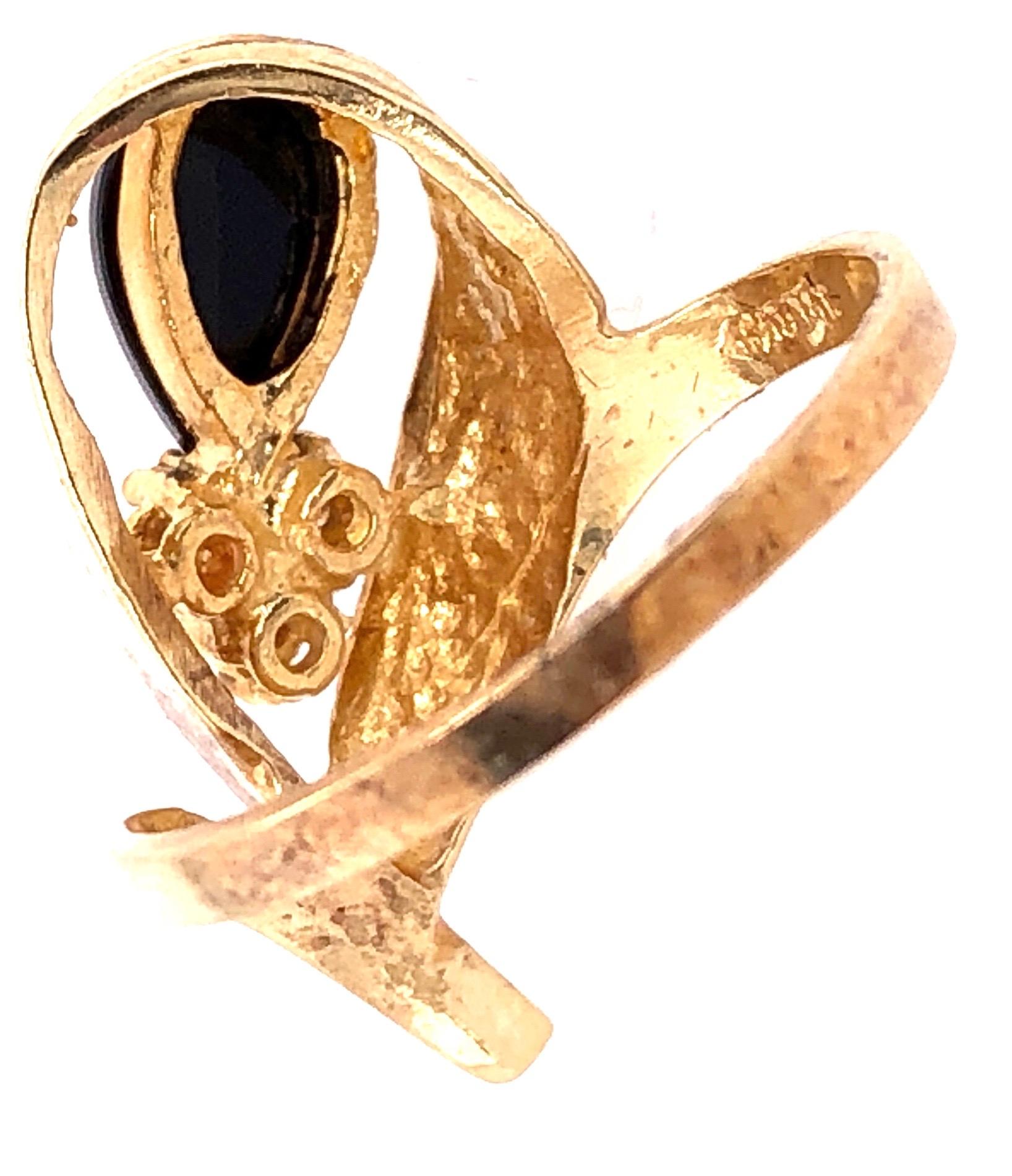 14 Karat Onyx and Diamond Yellow Gold Ring Freeform 0.03 TDW For Sale 1