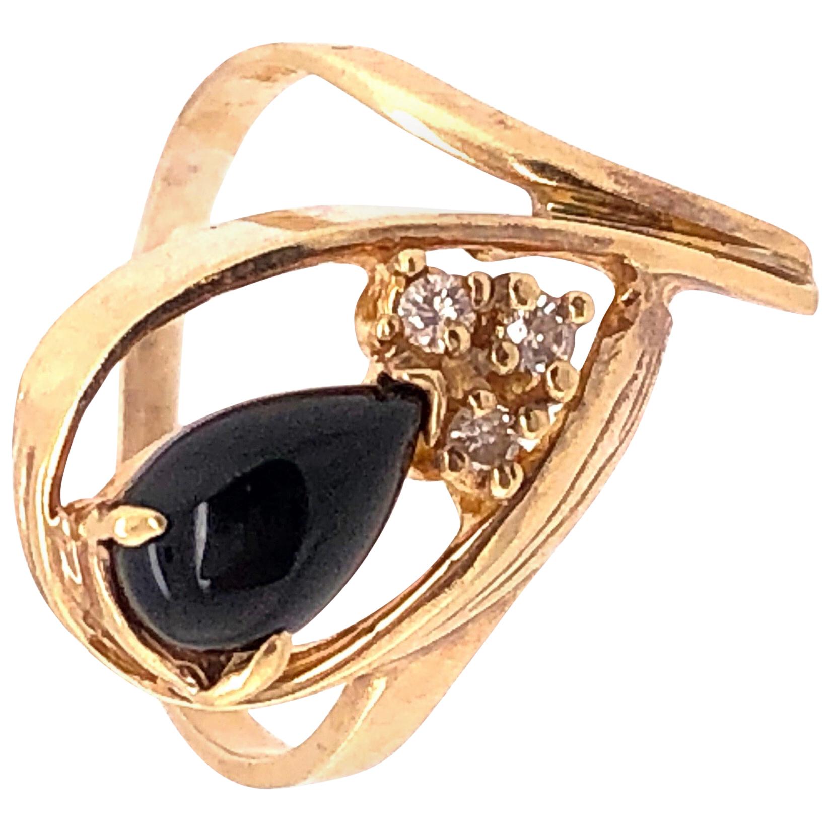 14 Karat Onyx and Diamond Yellow Gold Ring Freeform 0.03 TDW For Sale
