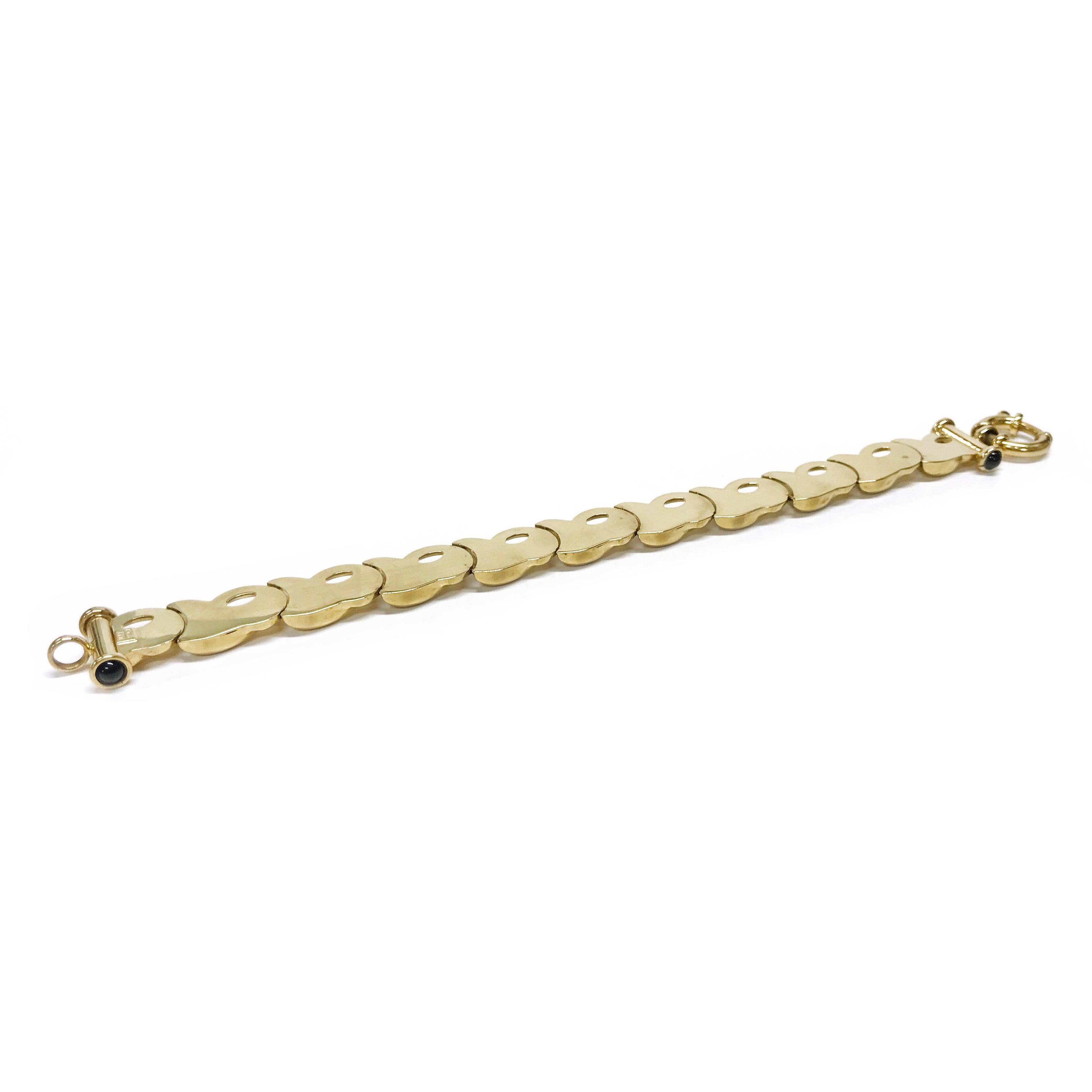 bracelet à maillons libres en onyx 14 carats. Ce bracelet comporte des maillons libres ornés de 12 mm à finition brillante. Le bracelet mesure 7,5
