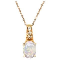 14 Karat Opal Pendant with Diamonds on an 18 inch chain