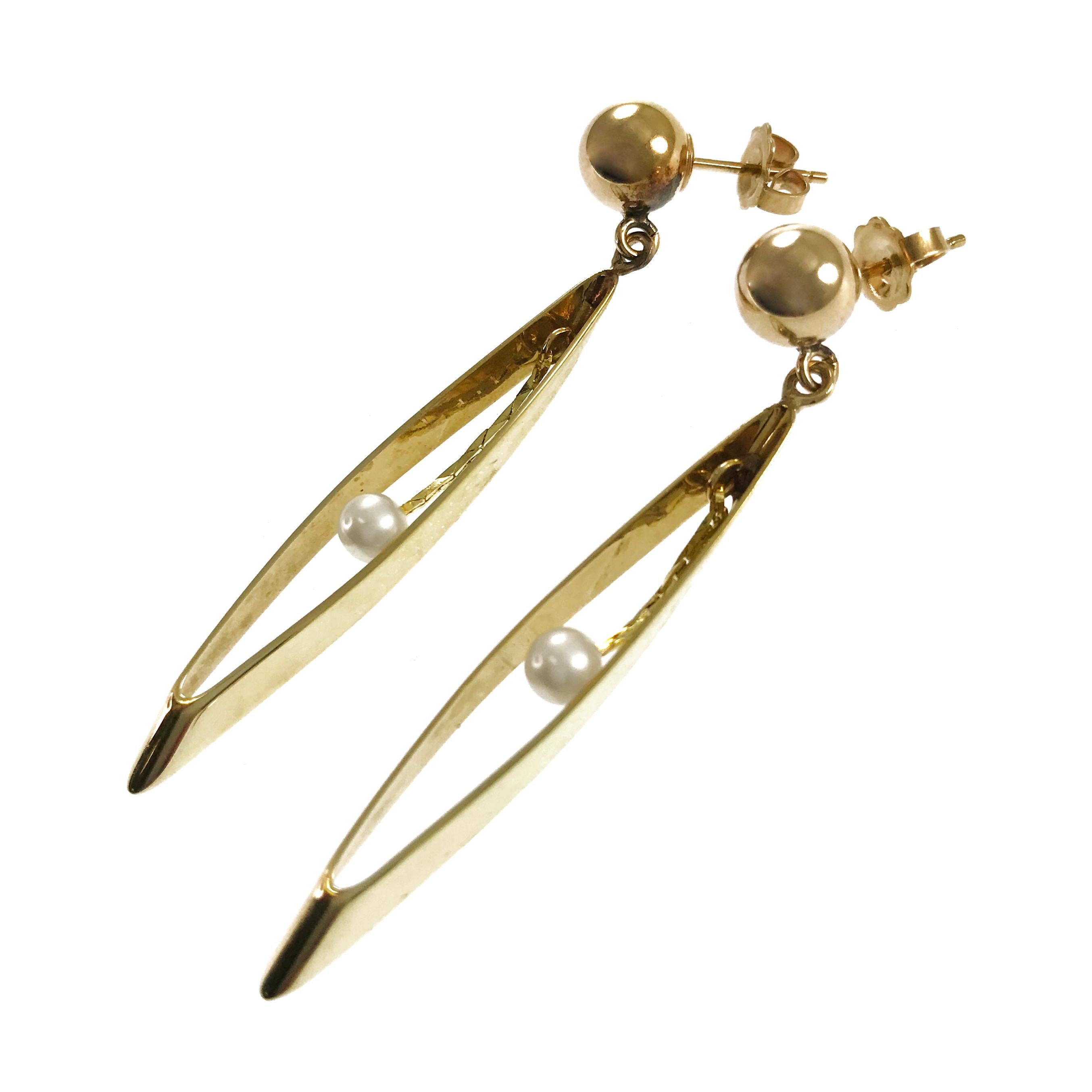 Oval Vertical Hoop Pearl Drop Earrings. These earrings contain a round gold bead stud with a slender oval hoop with a cobra chain that drops mid-way on the hoop with a Pearl at the end. The Pearls measure 4.25mm each. The earrings measure 54mm high
