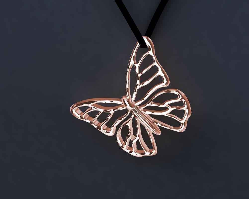 Tiffany designer, Thomas Kurilla created this 14 Karat Pink Gold Butterfly Necklace on Suede, K.I.S.S. Keep it simple seasonally. ? Hand sculpted.  Keep your winter time thoughts warm with this butterfly pendant. Flat black ultra suede 30 inches so