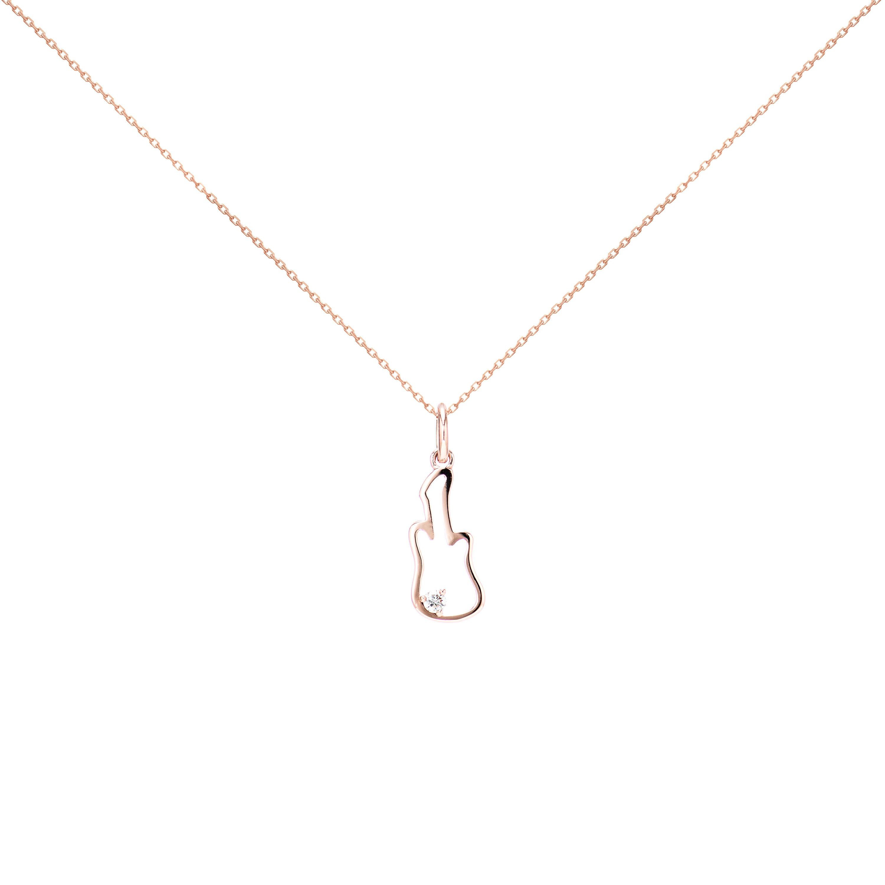 AS29
14kt rose gold diamond Guitar necklace
Follow the music or should we say follow the necklace? Constructed from 14kt rose gold and adorned with a diamond, this Guitar necklace from AS29 will be like music to your décolletage. Press