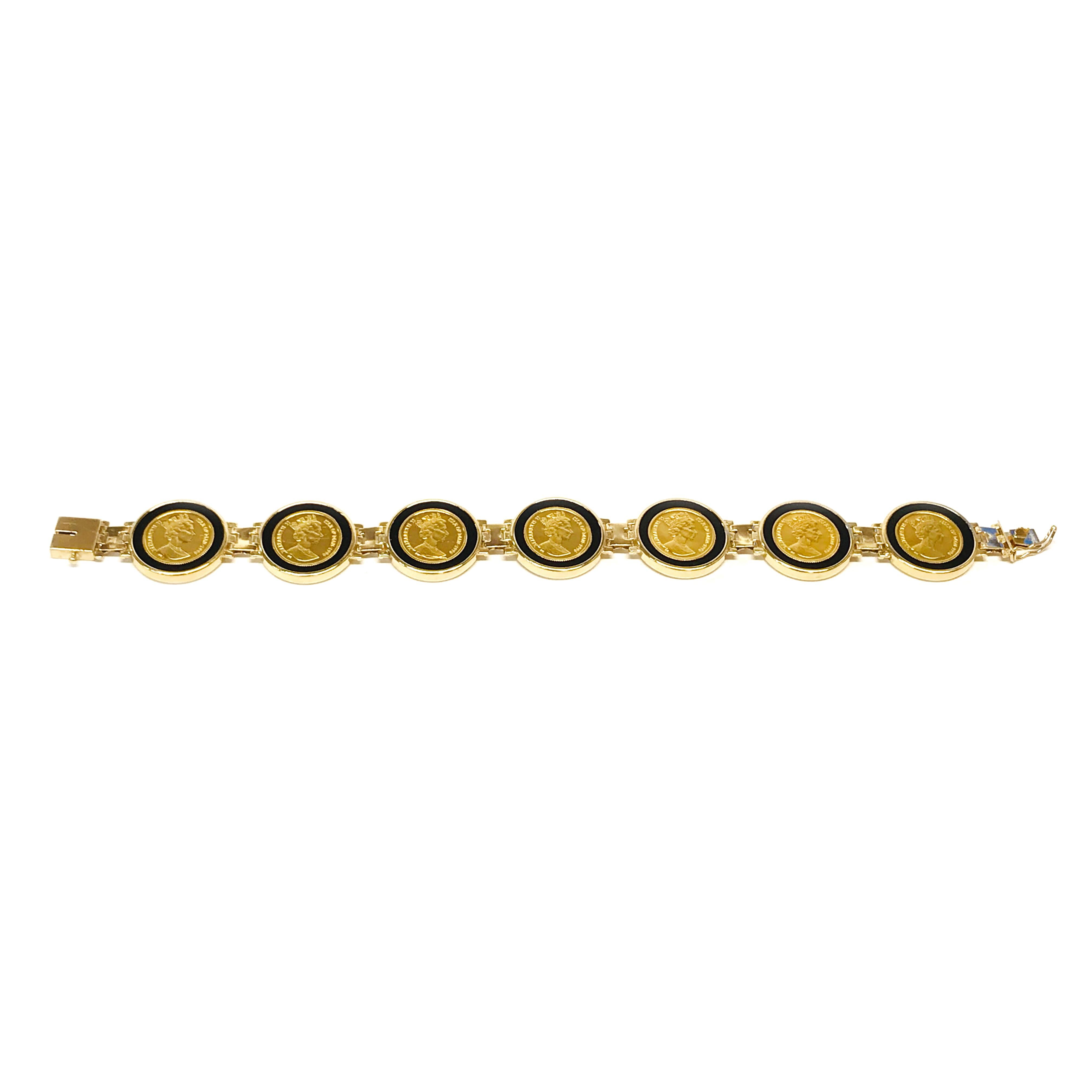 14 Karat Queen Elizabeth II Coin Bracelet. This lovely bracelet features seven 1996 Isle of Man coins flush-set in round onyx. The coin depicts the likeness of Her Majesty Queen Elizabeth II. The bracelet is 7.5
