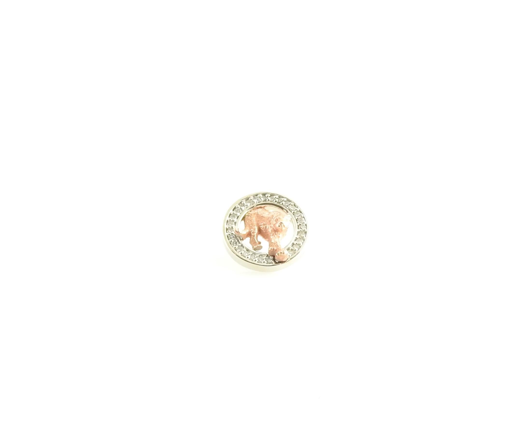 Vintage 14 Karat Rose and White Gold Diamond Tiger Tie Tack

This elegant tie tack features a beautifully crafted rose gold tiger surrounded with 26 round brilliant cut diamonds set in classic 14K white gold.

Approximate total diamond weight: .13