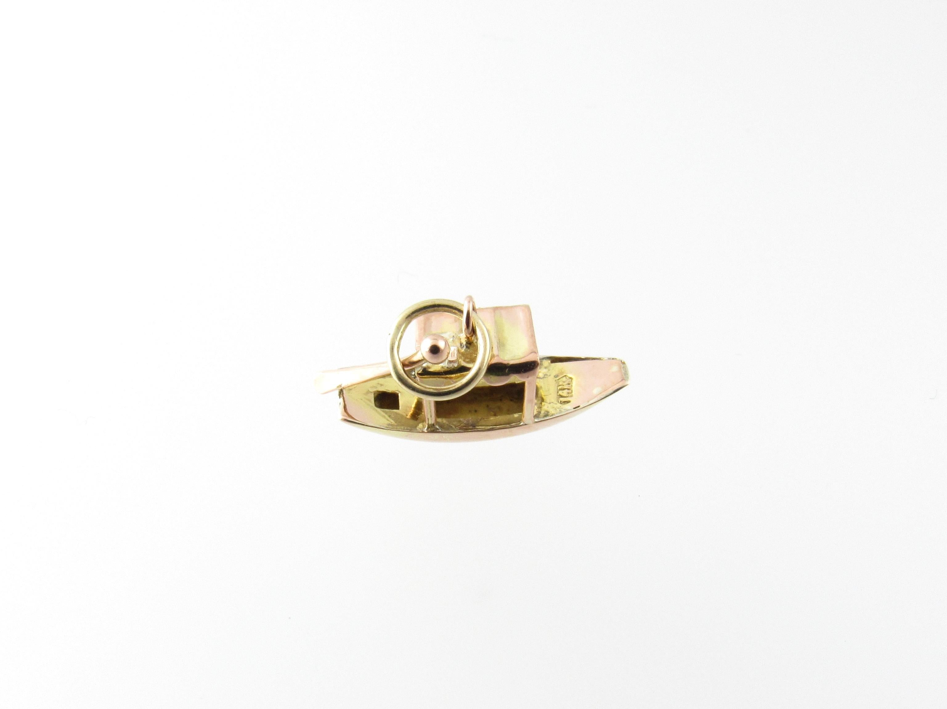 Vintage 14 Karat Yellow and Rose Gold Fishing Boat Charm

This lovely charm features a 3D fishing boat meticulously detailed in 14K yellow gold.

Size: 10 mm x 19 mm (actual charm)

Weight: 0.6 dwt. / 1.0 gr.

Stamped: 14K

Very good condition,