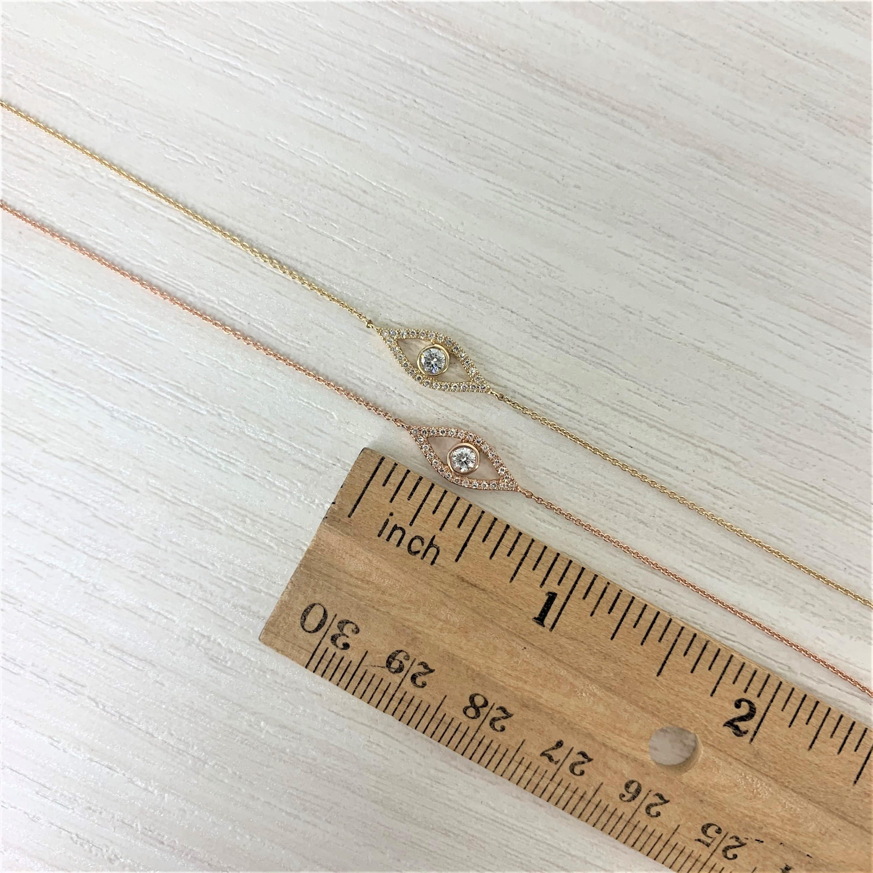 Round Cut 14 Karat Rose Gold 0.15 Carat Diamond Evil Eye Necklace For Sale