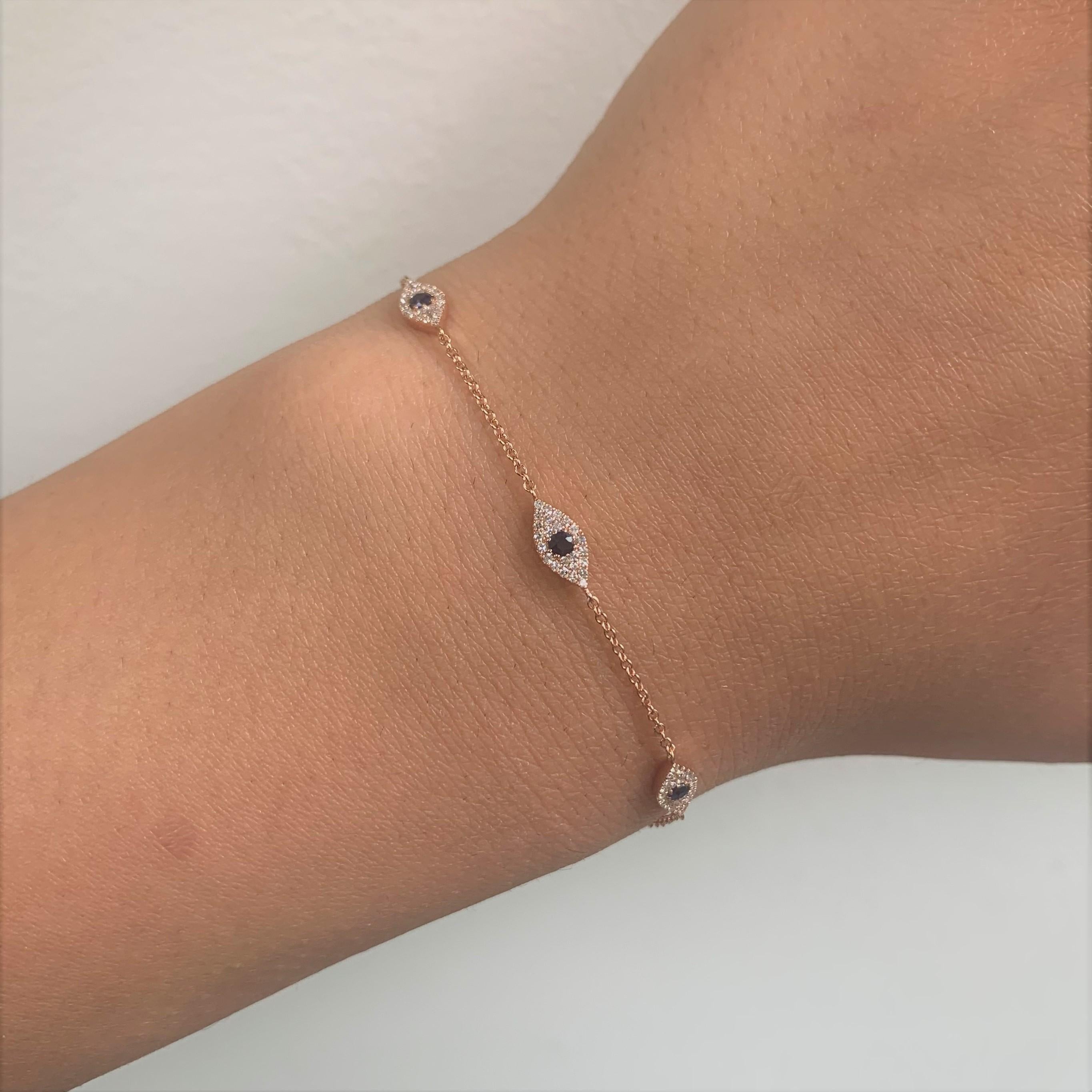 Add this station Evil Eye bracelet to your look! Crafted of 14k Gold and 0.26 ct. of Round Sparkly natural Diamonds and 0.27 ct. of shiny blue sapphires. Diamond Color and Clarity GH-SI1-SI2.  Bracelet is adjustable up to 7