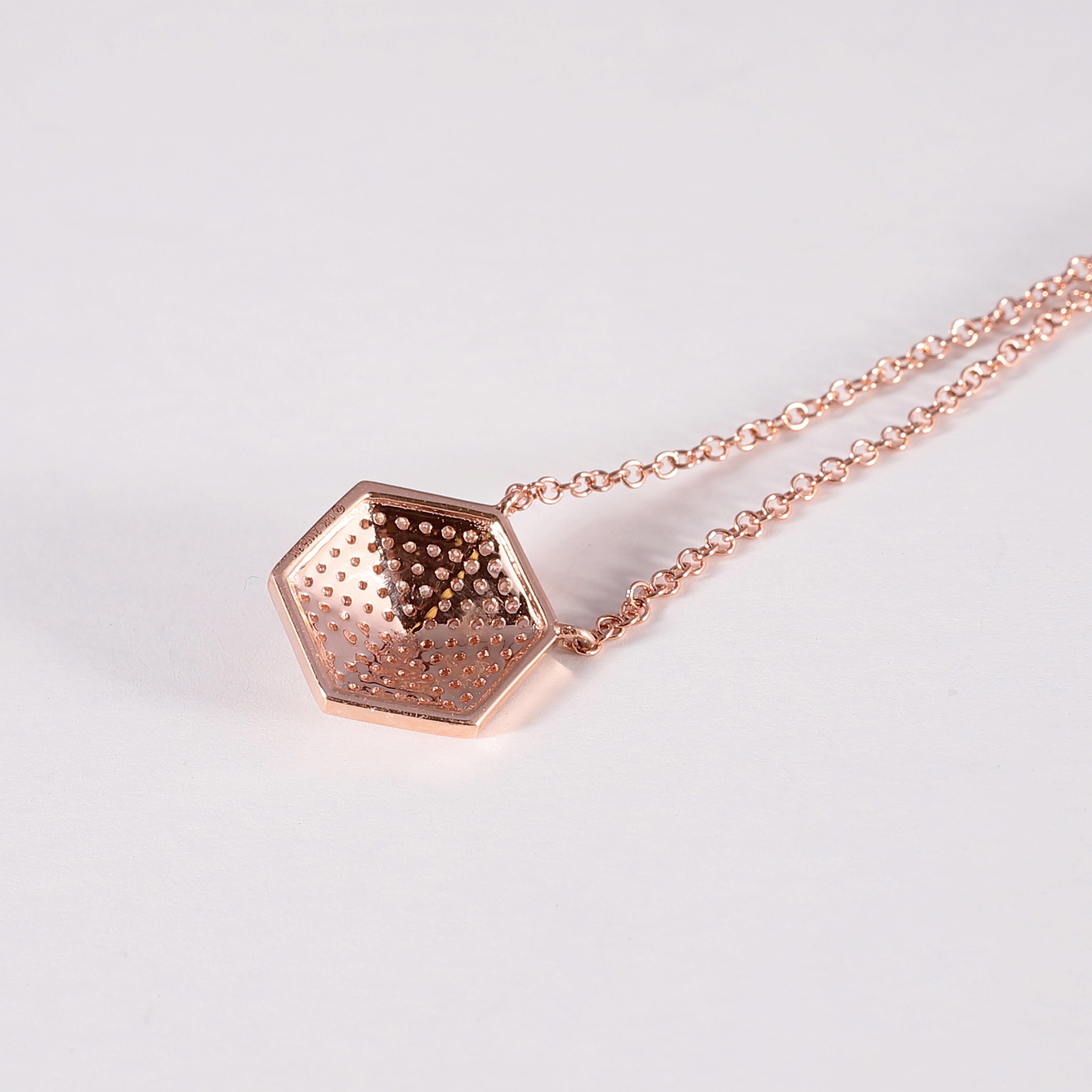 Such a classic!  Wear it alone or pair it with our rose gold, square diamond pendant necklace for a totally different look!
The 14 karat rose gold, interlocking link chain is centered with a rose gold, hexagon-shaped, 0.30 carat diamond pendant.
