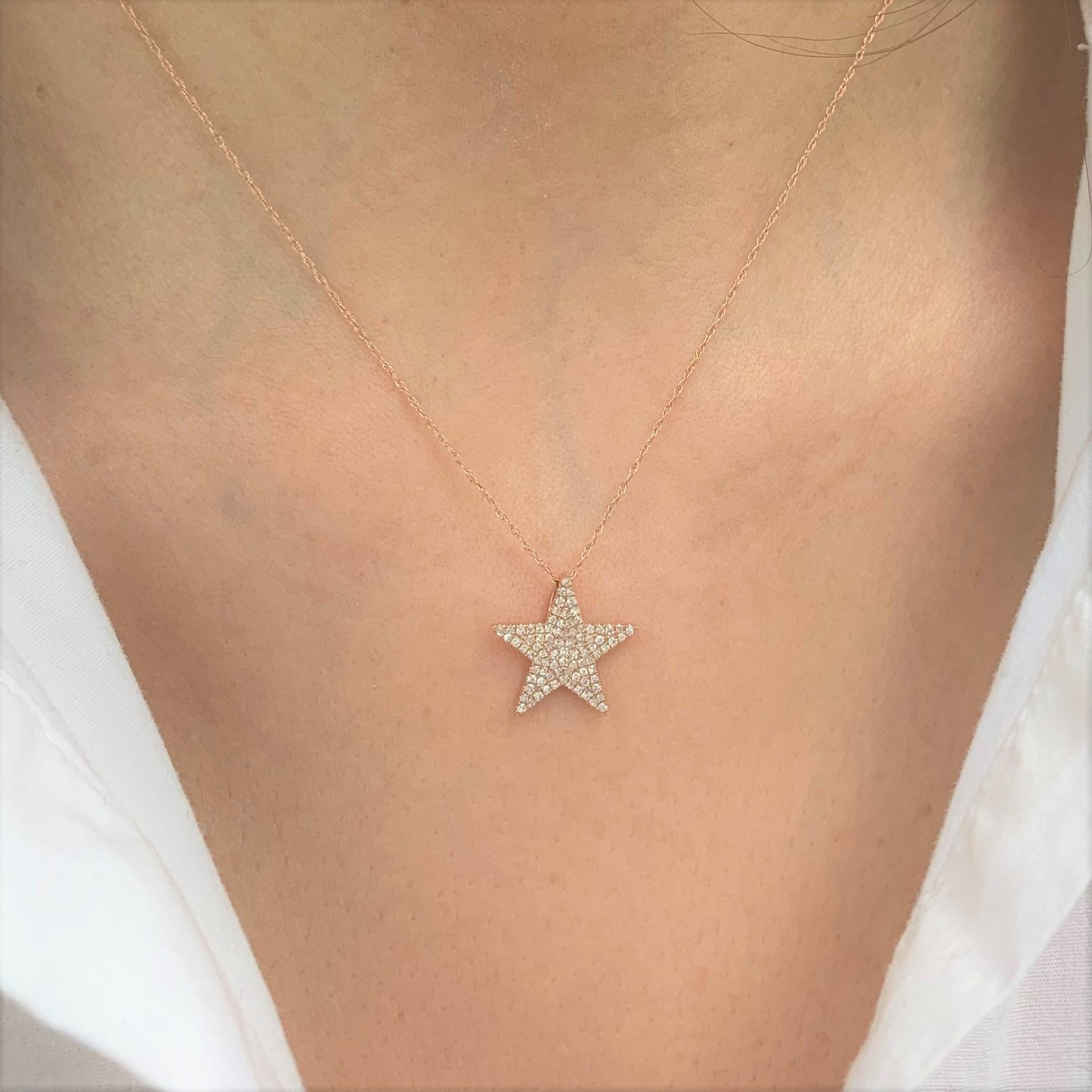 A classic yet trendy Star necklace crafted of 14k Gold featuring approximately 0.32 ct. of round Diamonds on a 16