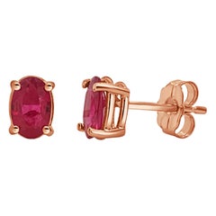 Orecchini in oro rosa 14 carati da 1,11 carati con rubino rosso di forma ovale