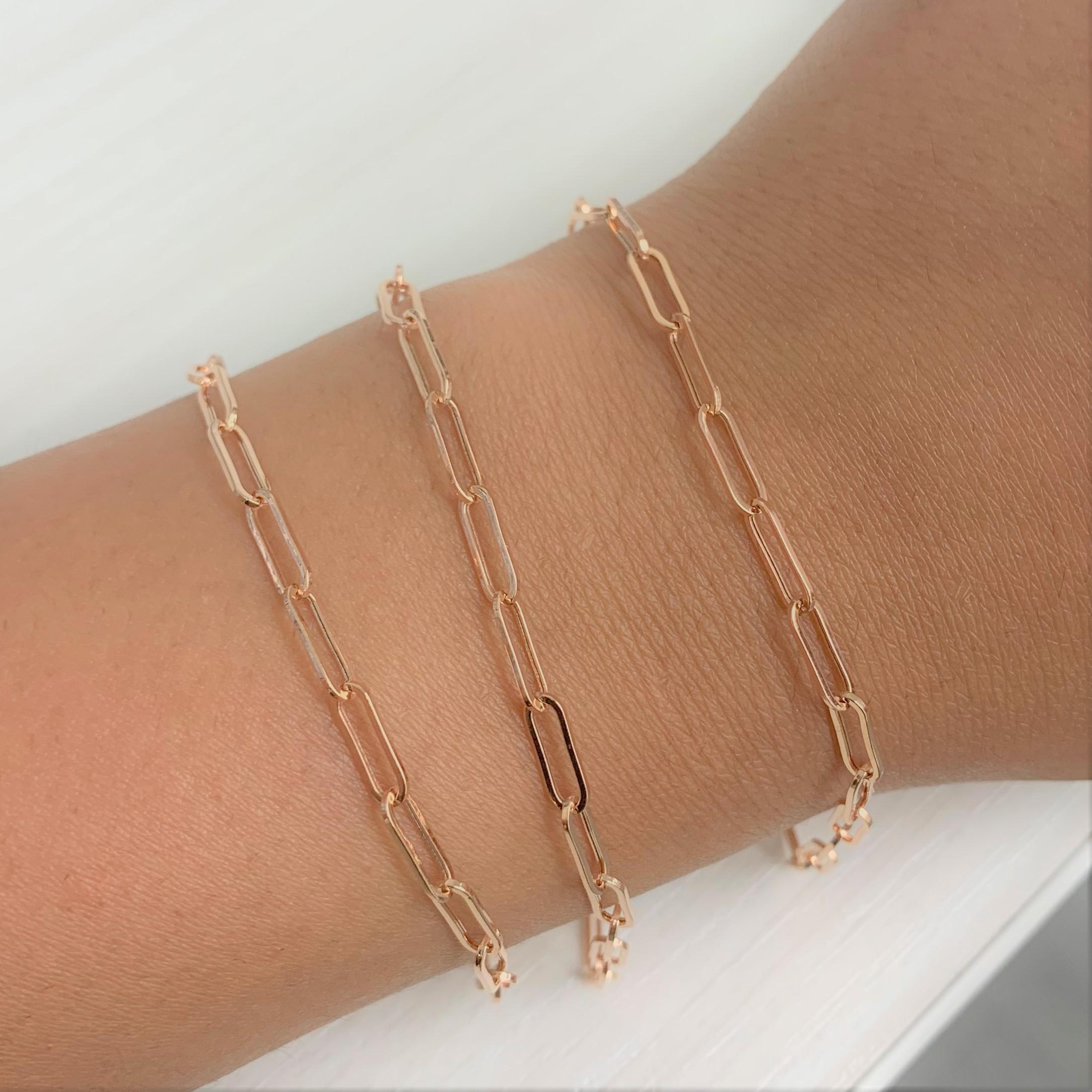EFFORTLESSLY CHIC - Wrap your wrist in this dainty 14k Yellow Or Rose Gold Paperclip  link bracelet. Crafted in Italy, the paperclip look creates an organic design with brilliant shine. This chain bracelet opens up making it simple to close lobster