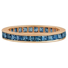 14 Karat Rose Gold 2.20ctw Channel-Set Princess Cut Blue Sapphire Eternity Band