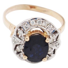 14 Karat Rose Gold 2.4 Karat Oval Sapphire and Diamonds Ring