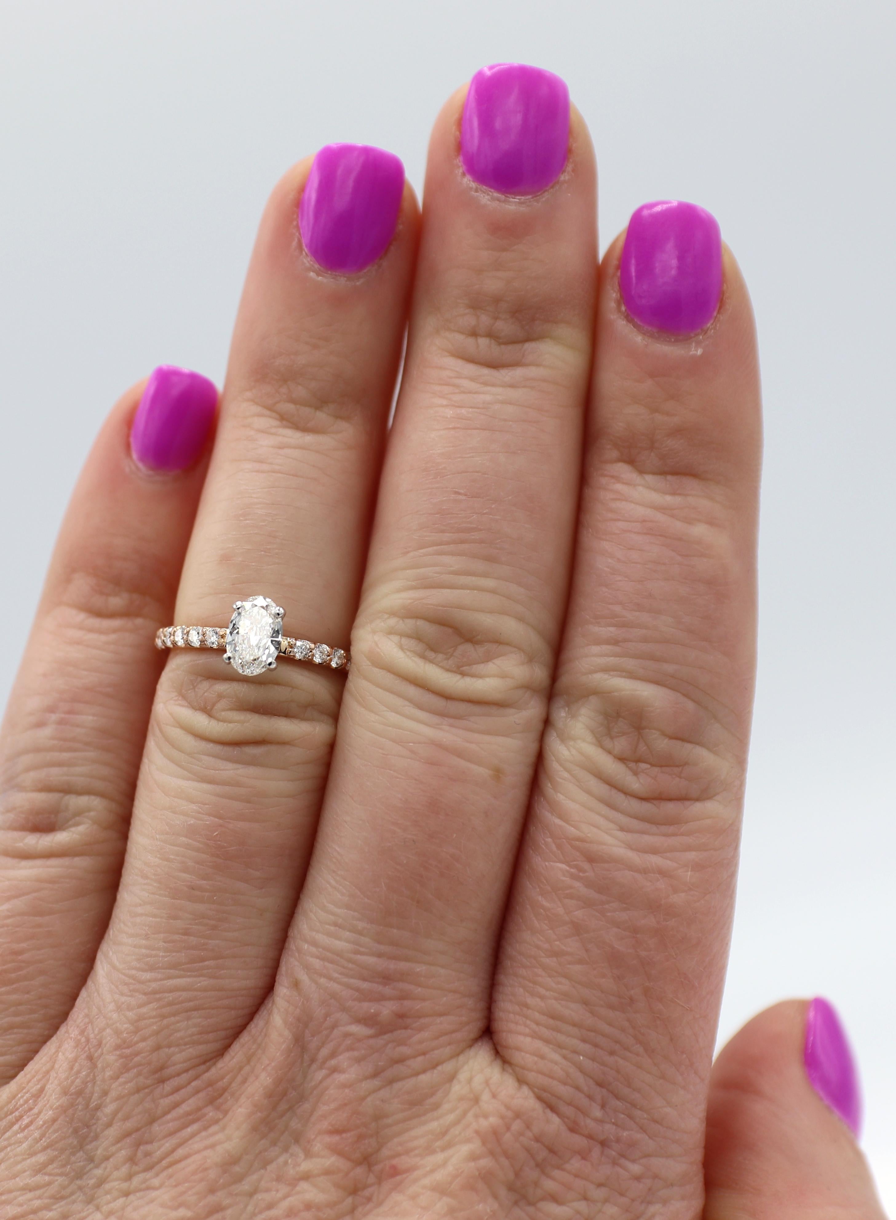 Modern 14 Karat Rose Gold .55 Carat Oval Natural Diamond Engagement Ring For Sale