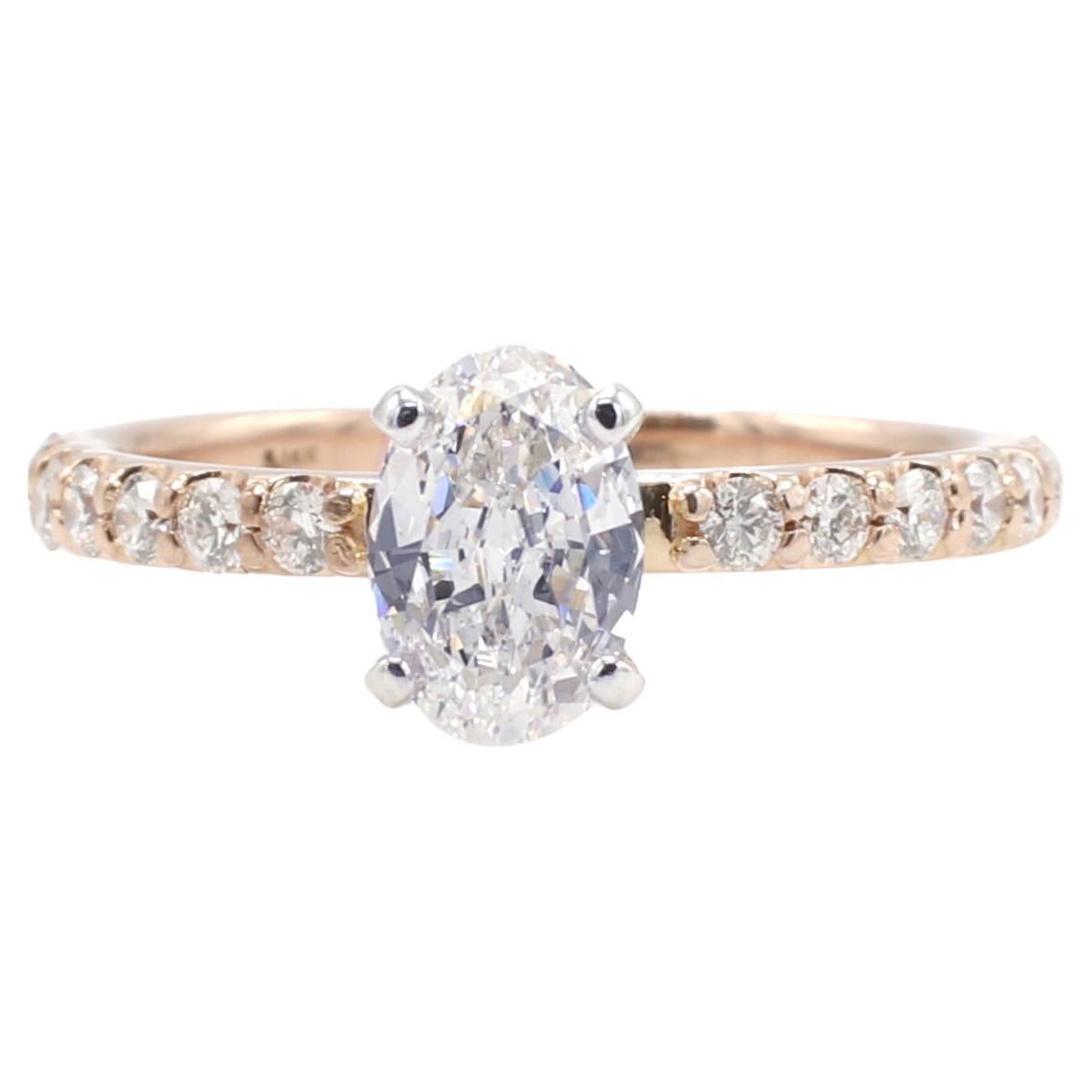14 Karat Rose Gold .55 Carat Oval Natural Diamond Engagement Ring For Sale