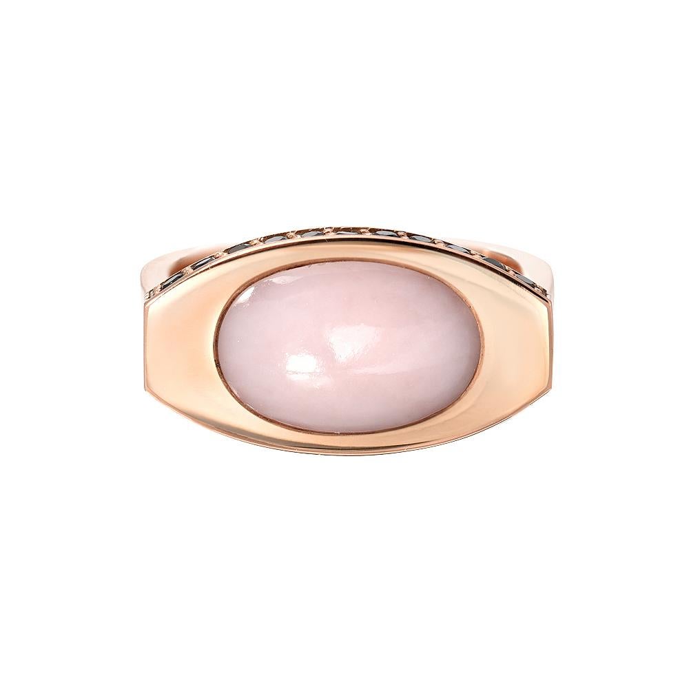 This 14k Signet features a pink opal cabochon surrounded by pavé black onyx.  It has a flat rectangular band that makes for a comfortable fit.  

This is a made-to-order piece, so please allow 3-4 weeks for delivery. For rush options please contact.