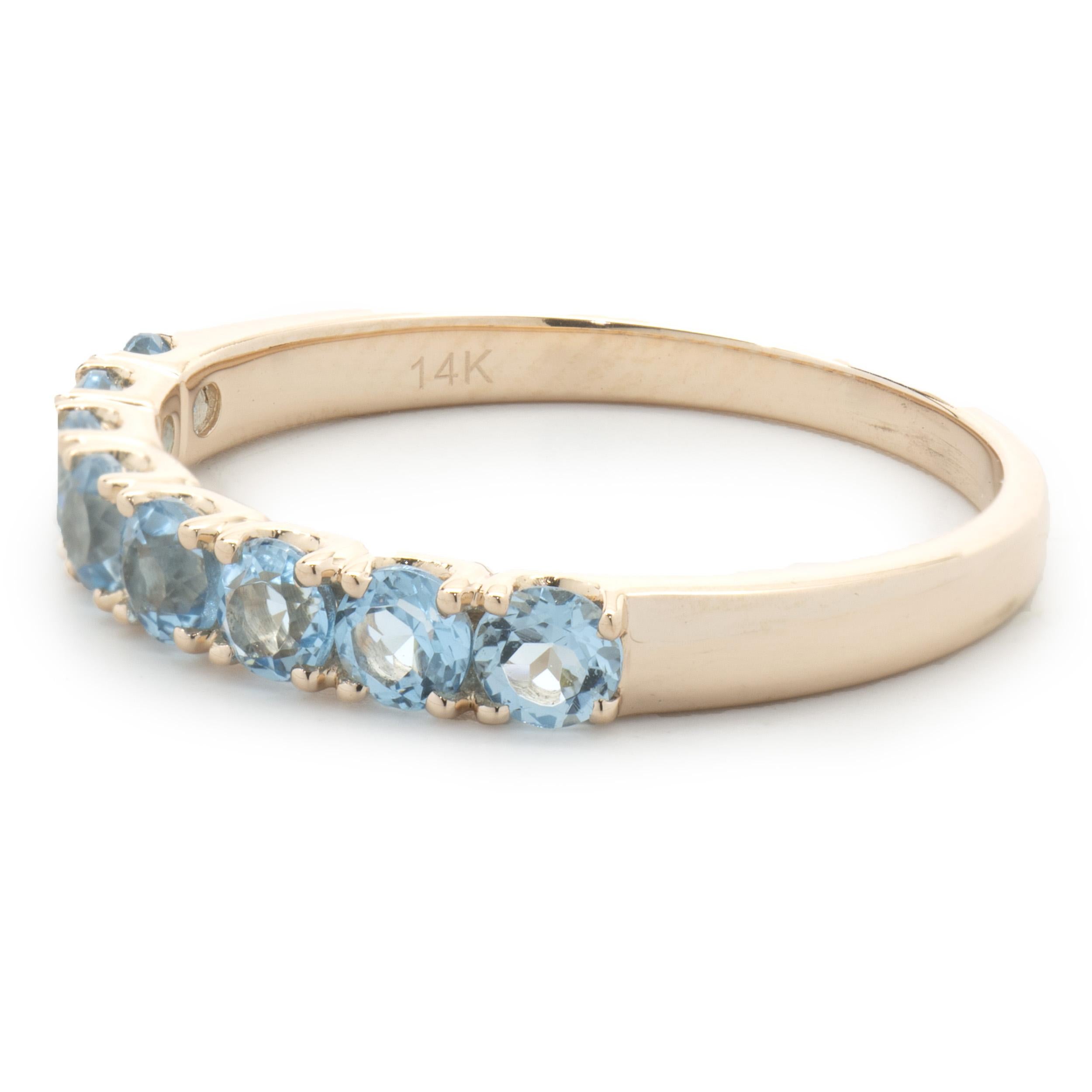 Designer: custom design
Material: 14K rose gold
Apatite: 8 round cut = 0.96cttw
Dimensions: ring top measures 3mm wide
Ring Size: 8.5 (please allow two extra shipping days for sizing requests) 
Weight: 2.40 grams
