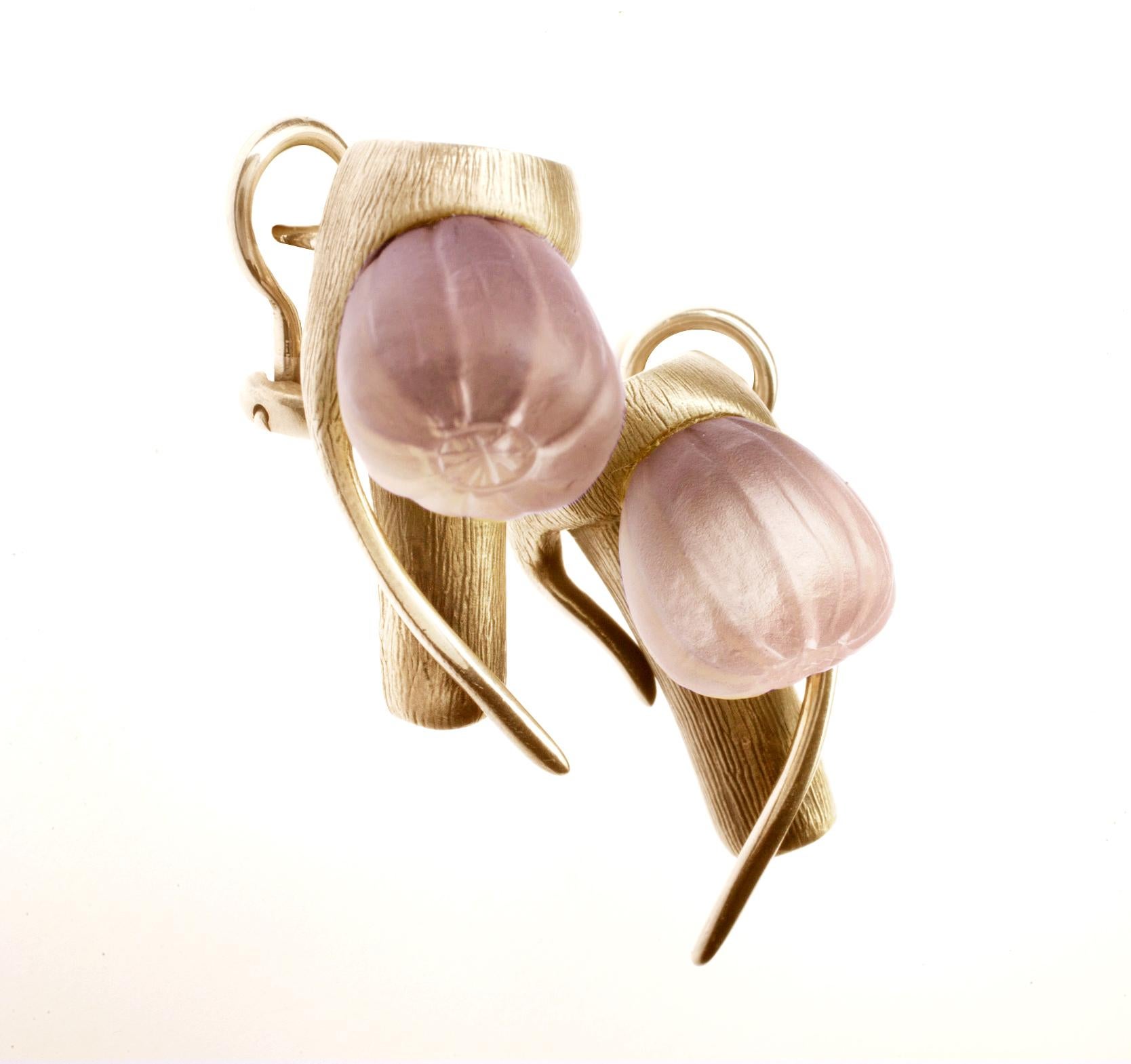 These contemporary Fig cocktail earrings are made of 14 karat rose gold with tender frosted rose onyx. The collection was featured in Harper's Bazaar UA editorial, published issue. The earrings were also selected by actress Anne Ratte-Polle to be