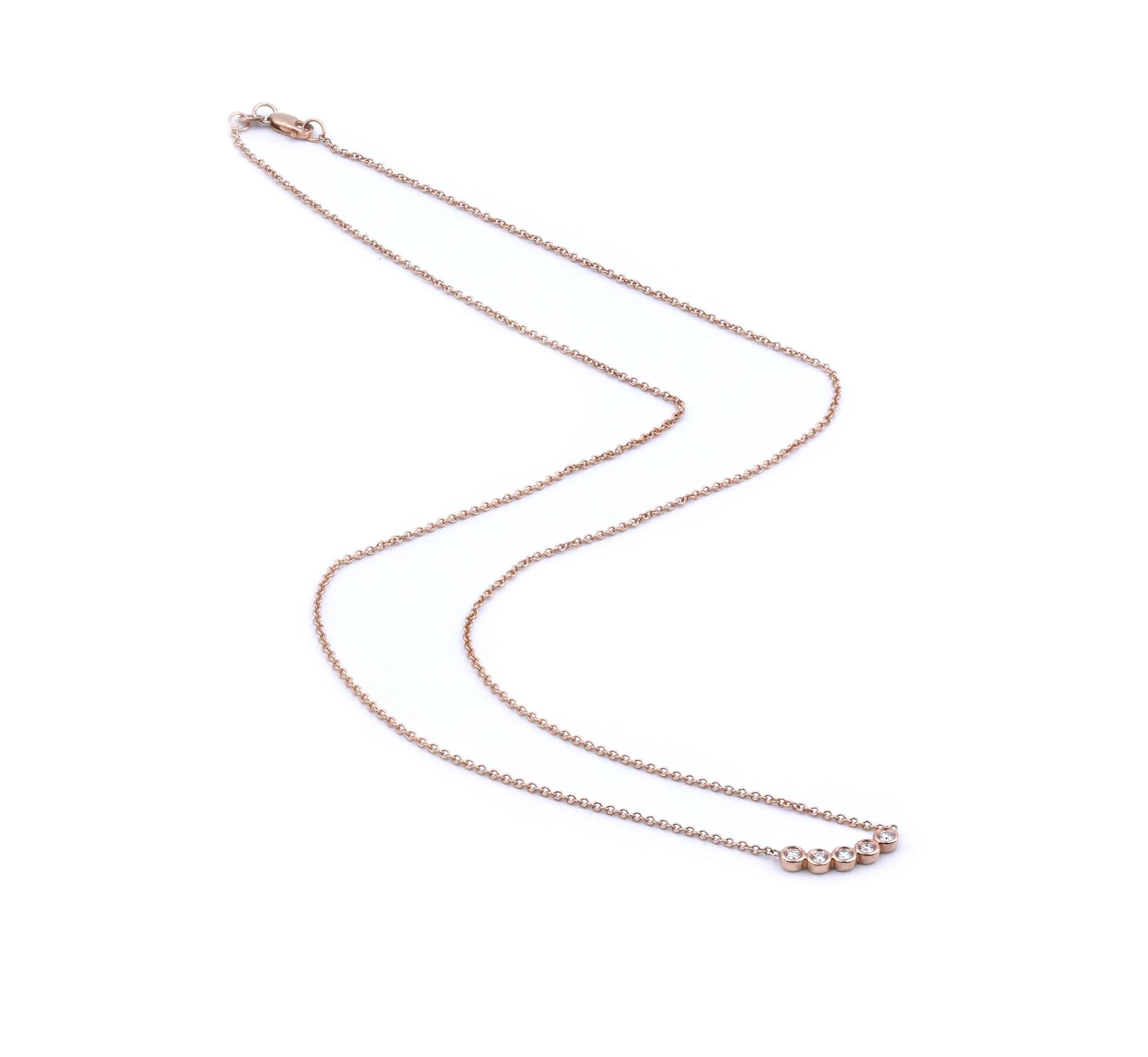 Diseñador: custom
Material: oro rosa de 14 quilates
Diamantes: 5 talla brillante redonda = .16cttw
Color: G
Claridad: VS
Dimensiones: el collar mide 18 pulgadas de largo
Peso: 2.55 gramos
