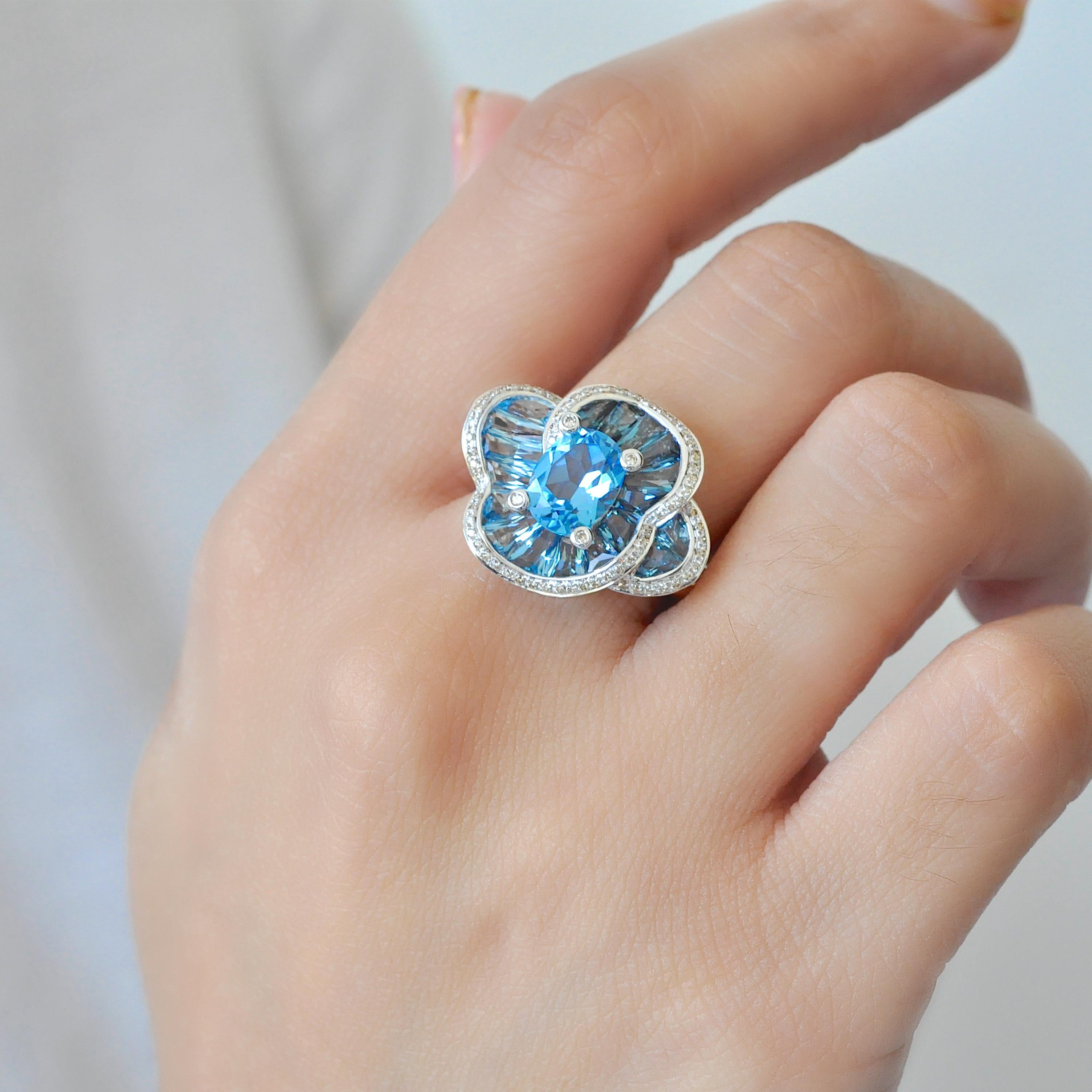Tapered Baguette 14 Karat Rose Gold Blue Topaz Special Cut Flower Contemporary Cocktail Ring For Sale