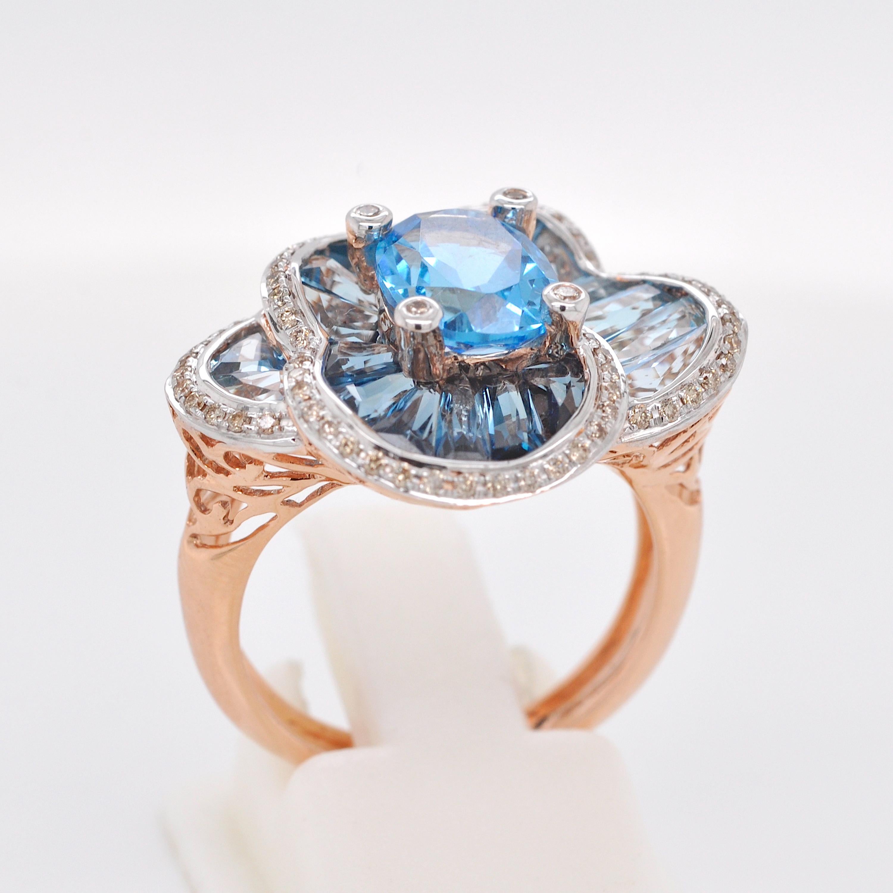 14 Karat Rose Gold Blue Topaz Special Cut Flower Contemporary Cocktail Ring In New Condition For Sale In Jaipur, Rajasthan