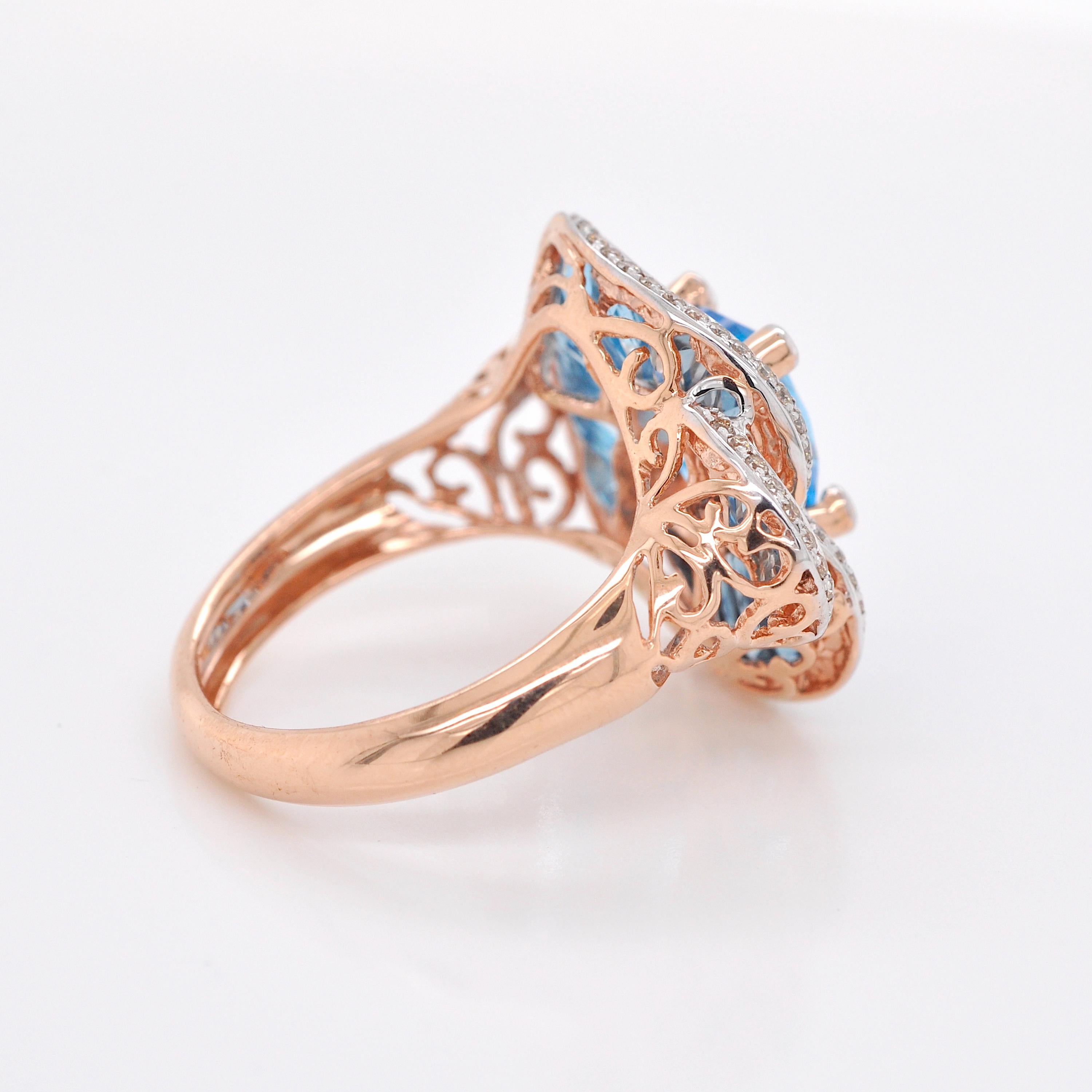 Women's 14 Karat Rose Gold Blue Topaz Special Cut Flower Contemporary Cocktail Ring For Sale
