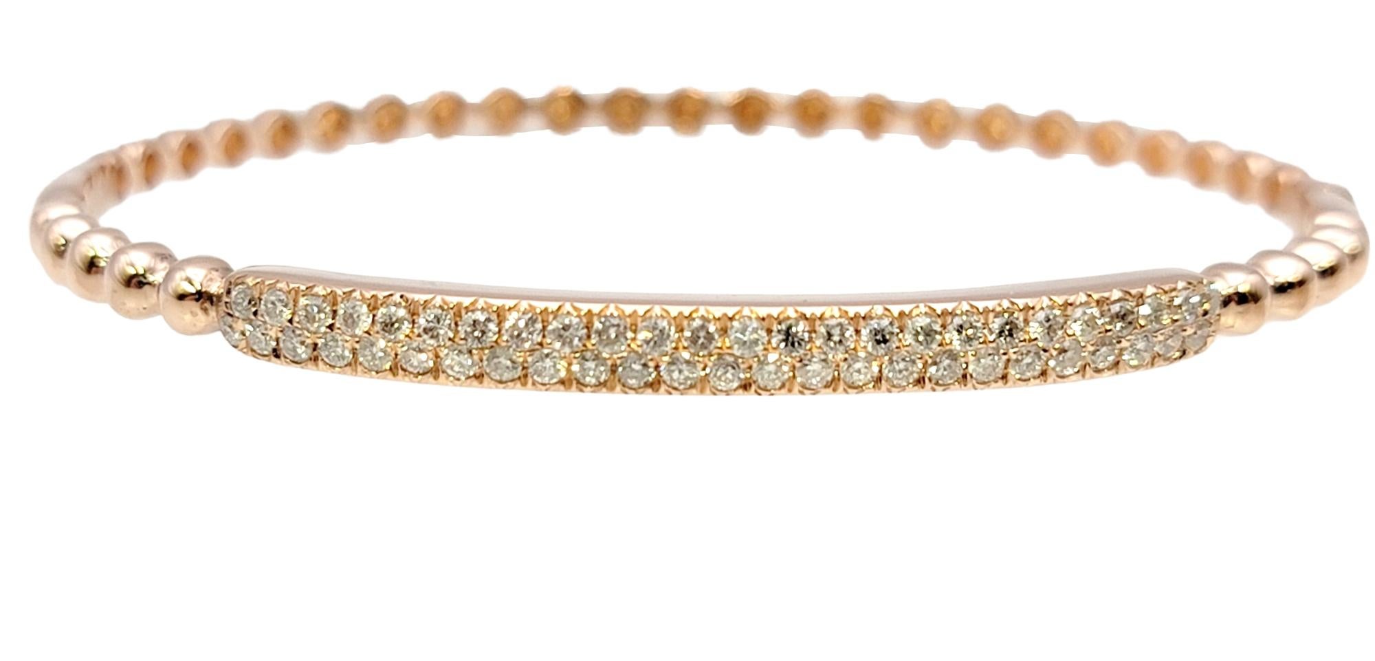 Round Cut 14 Karat Rose Gold Bubble Style Narrow Stacking Bangle Bracelet with Diamonds For Sale
